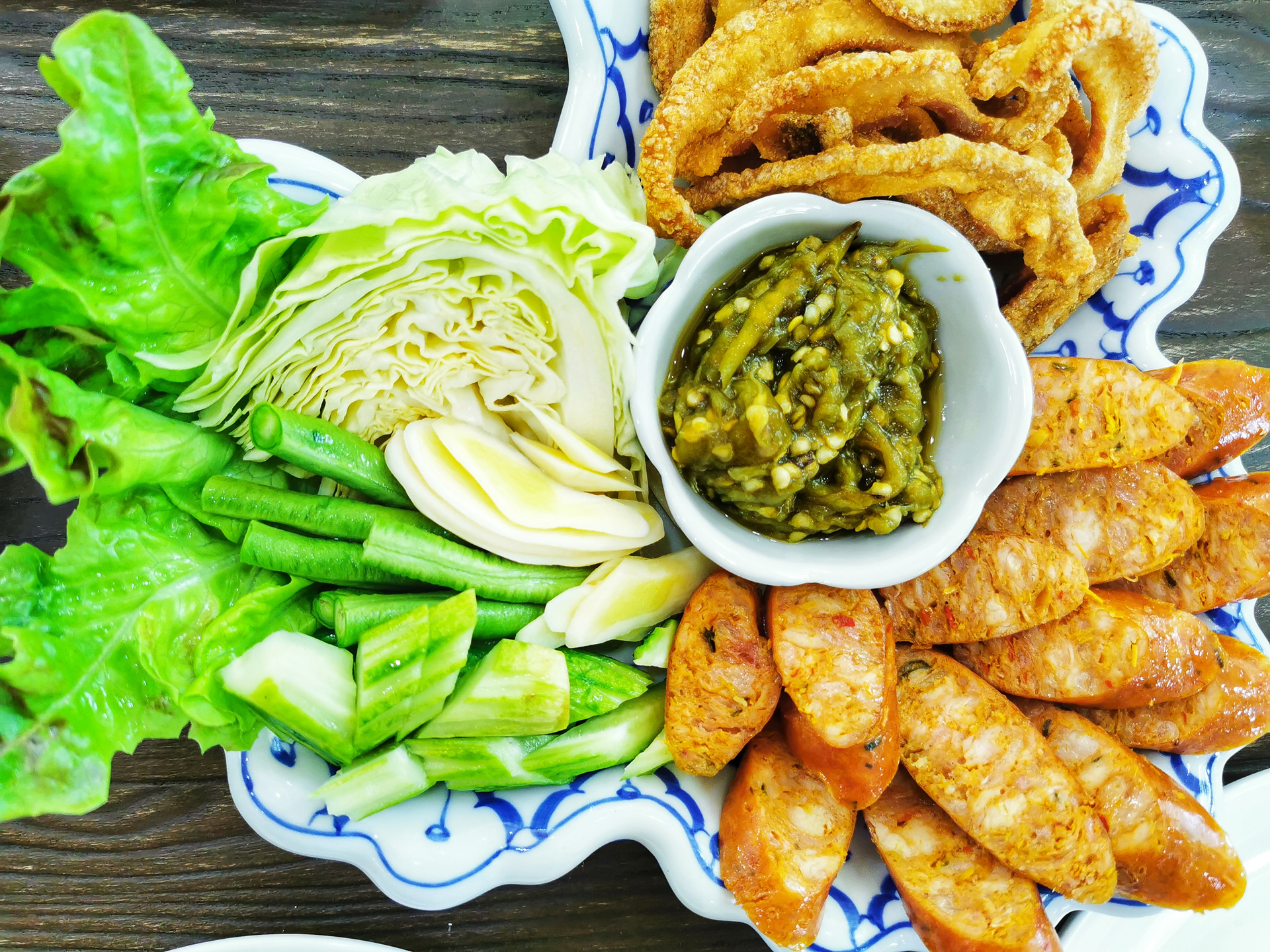 Cuban Marinated Green Plantain Frita with Lime Aioli — Snack served and photographed from above