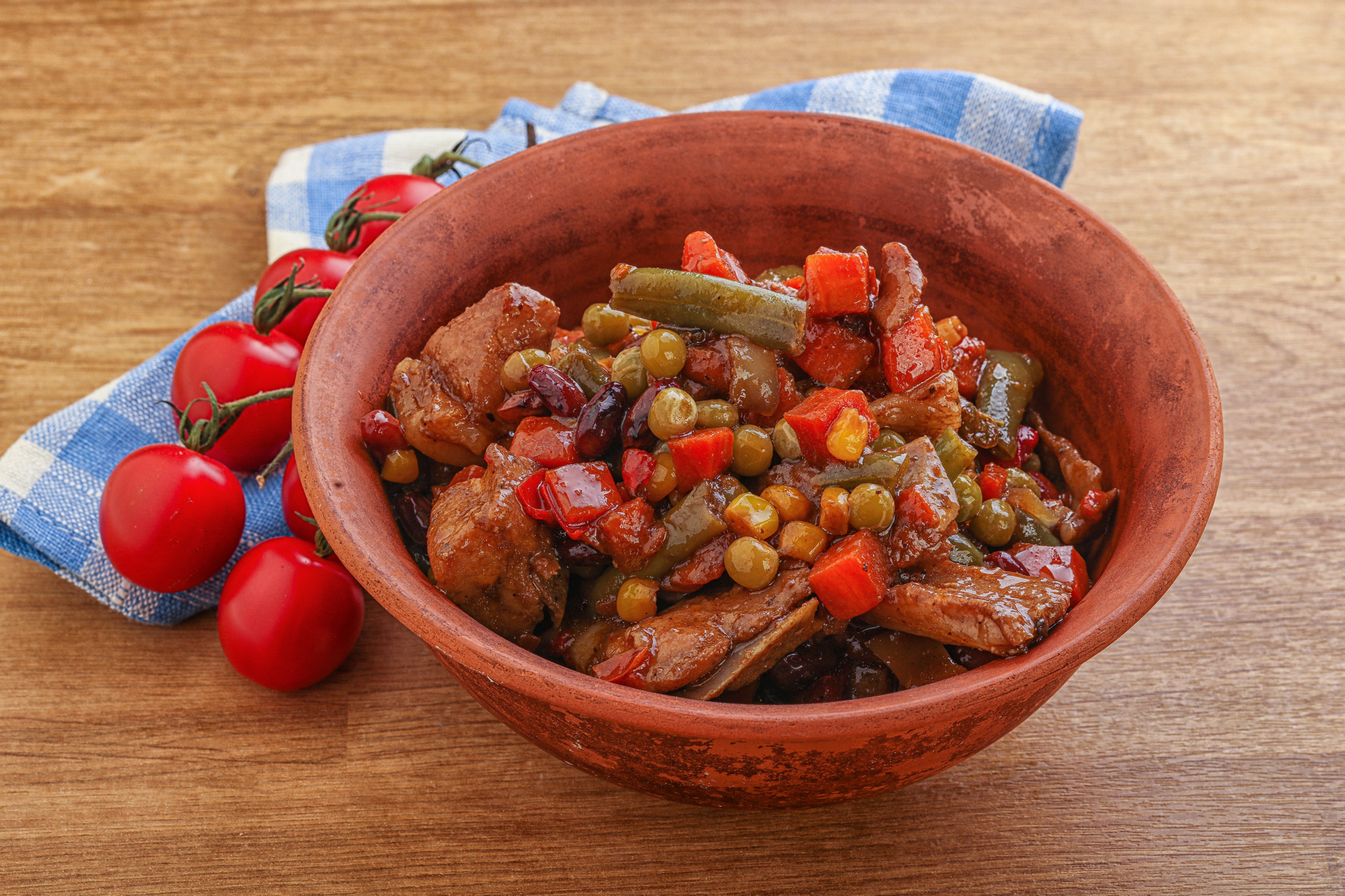 Overhead flat-lay of all ingredients for Cuban Ropa Vieja with Bell Peppers and Olives laid out on a kitchen surface.