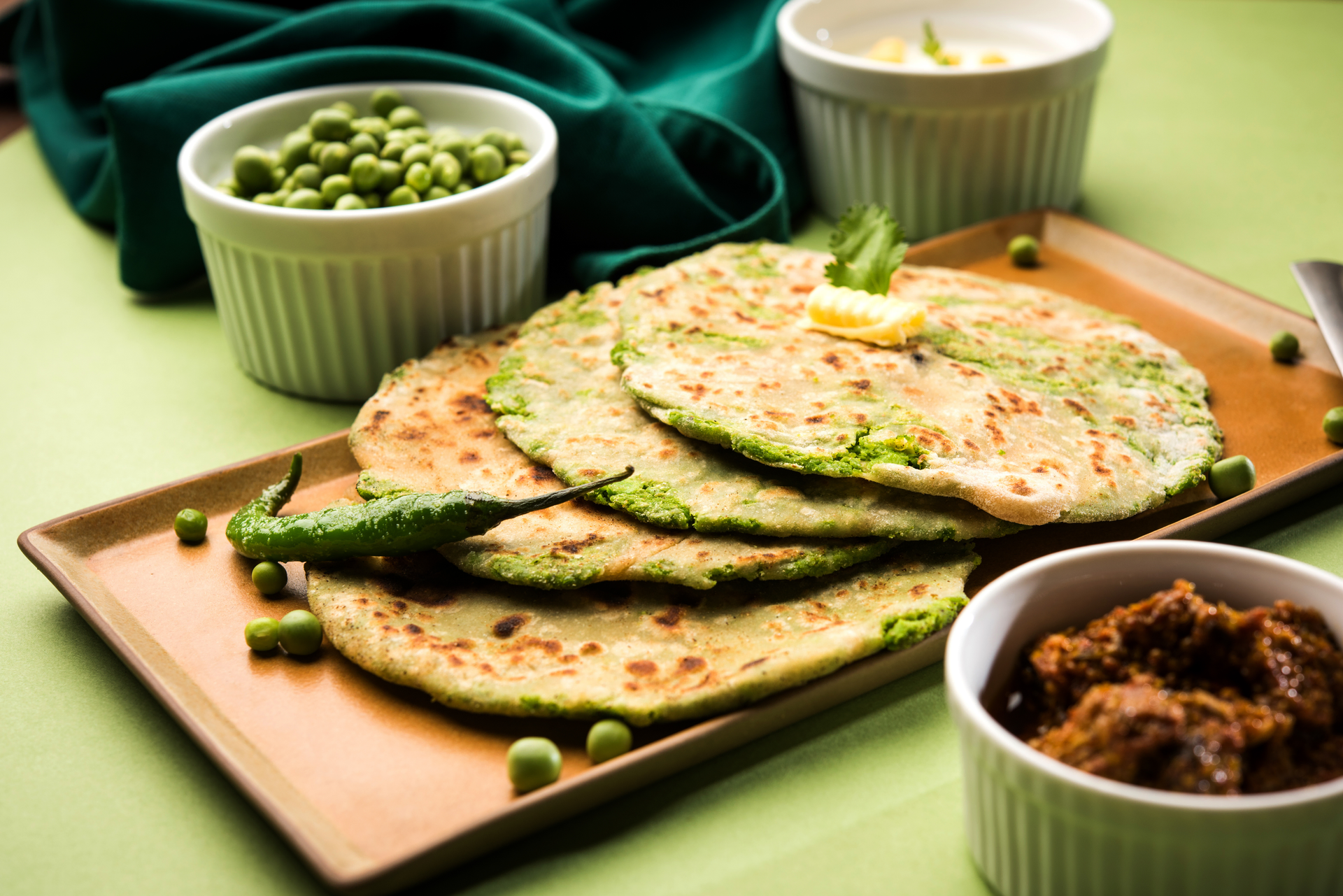 Curried Jamaican Ital Roti with Callaloo and Crunchy Nuts