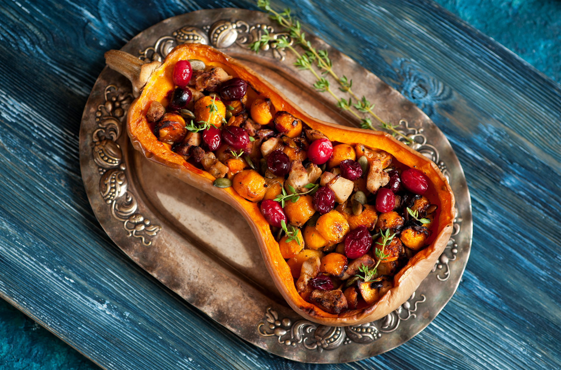 Overhead flat-lay of all ingredients for Cypriot Kolokotes with Sweet Pumpkin and Raisins laid out on a kitchen surface.