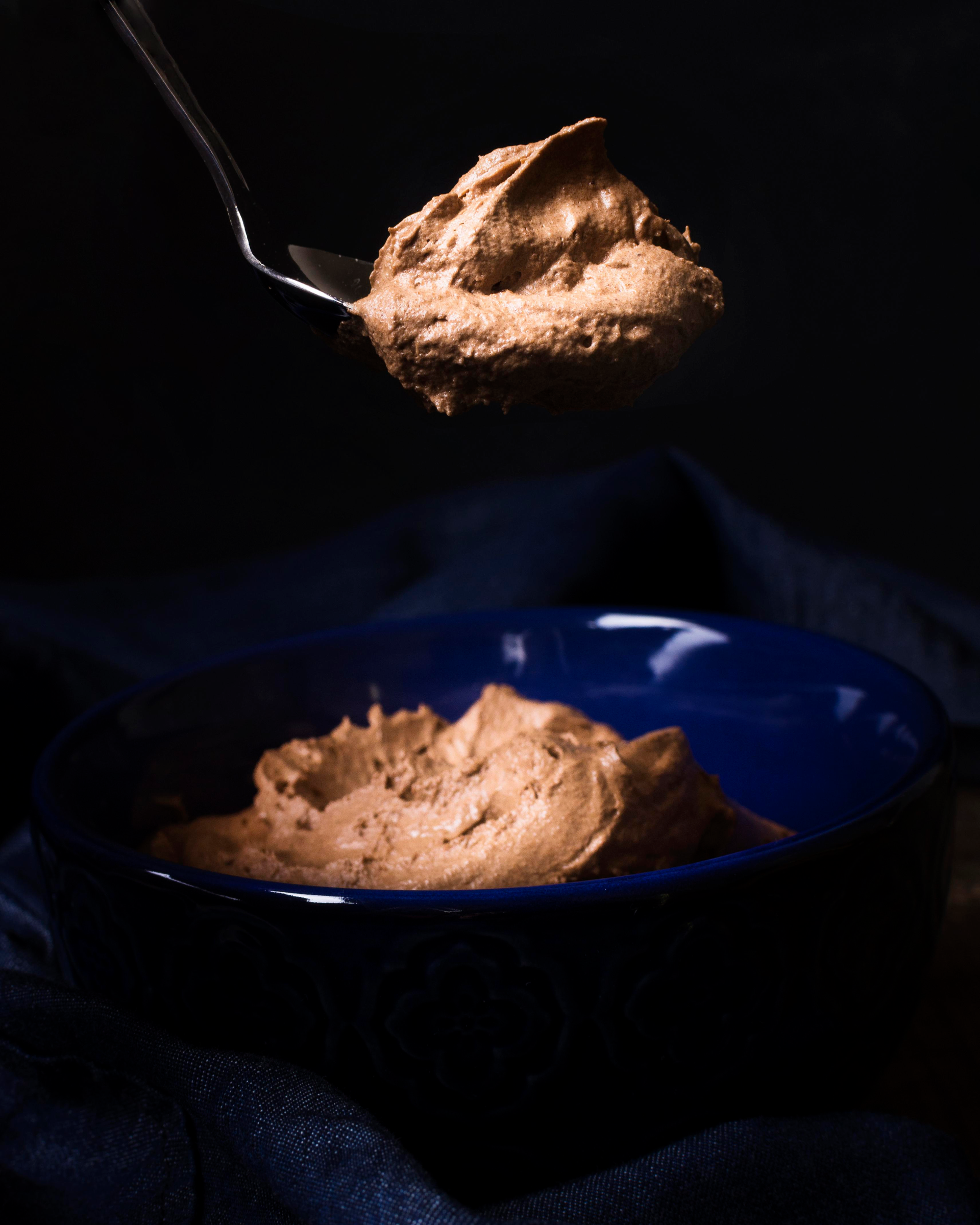 Decadent Belgian Chocolate Mousse with Hazelnut Praline — Dessert served and photographed from above