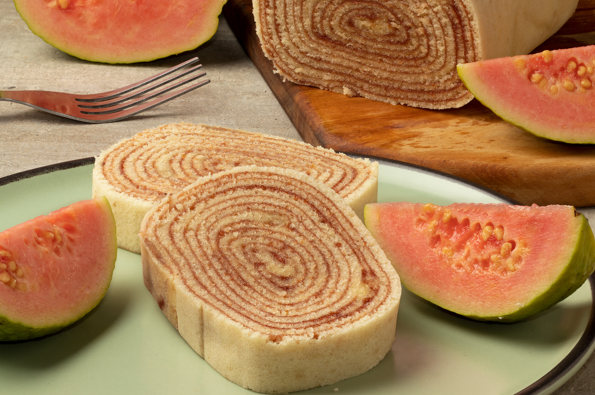 Decadent Brazilian Bolo de Rolo with Guava Paste — Dessert served and photographed from above