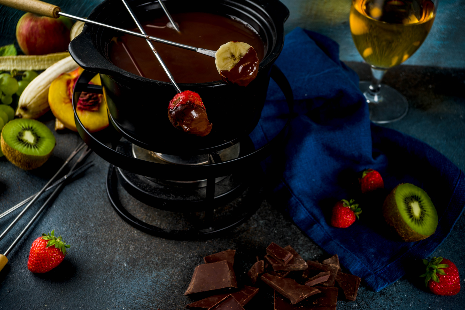 Decadent Swiss Chocolate Fondue with Seasonal Fruits — Dessert served and photographed from above