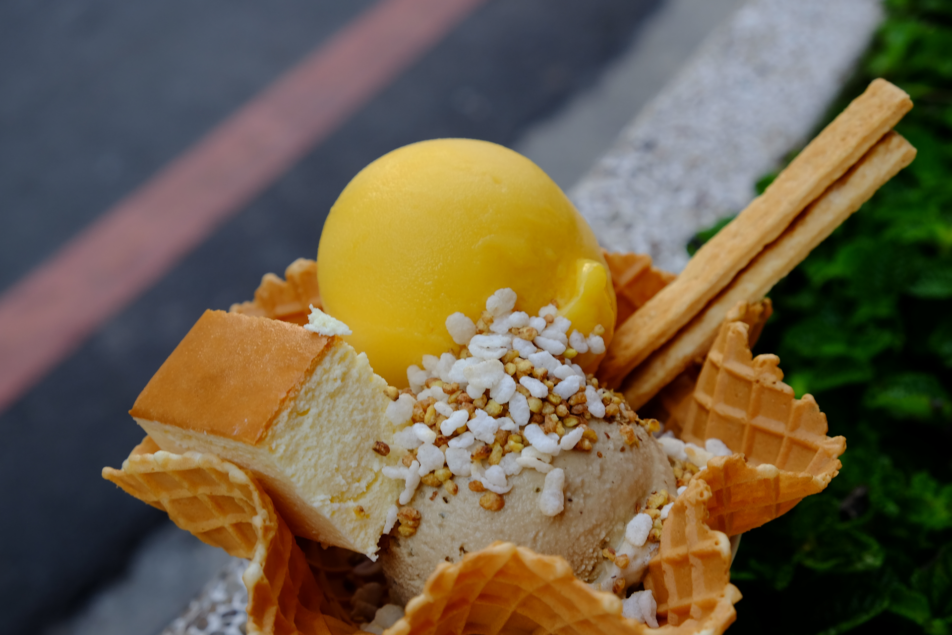 Overhead flat-lay of all ingredients for Delightful Croatian Fritule with Lemon Zest and Rum laid out on a kitchen surface.