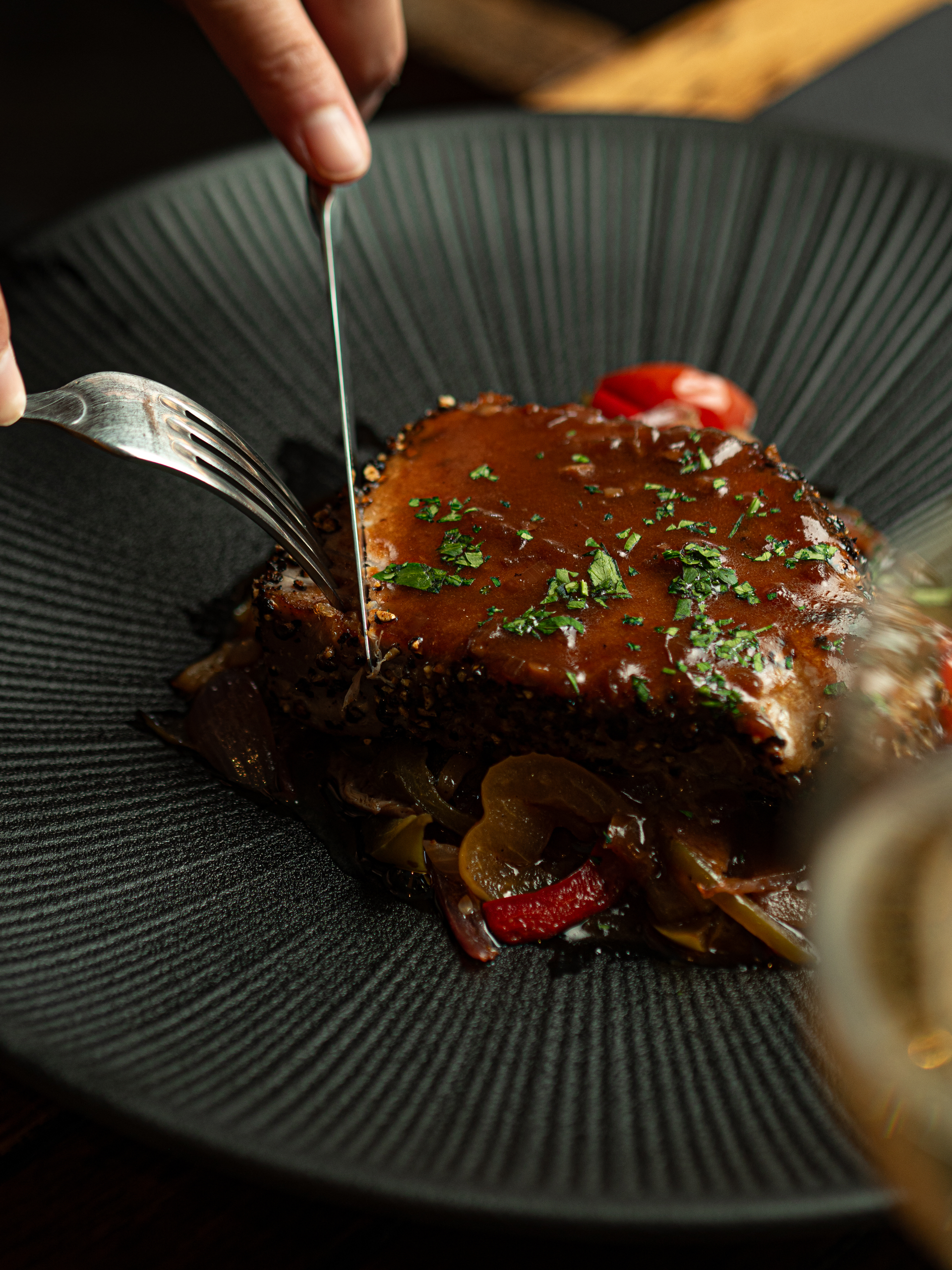 Overhead flat-lay of all ingredients for Elegant Argentine Malbec and Chocolate Braised Short Ribs laid out on a kitchen surface.