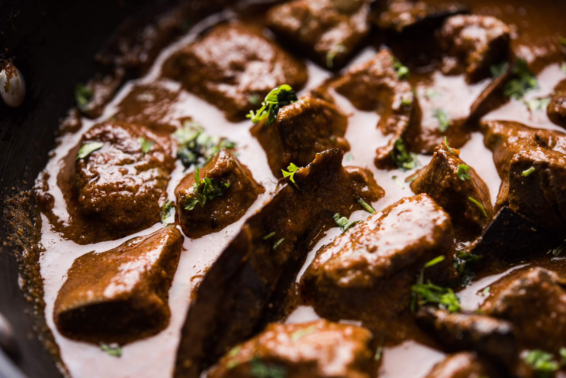 Overhead flat-lay of all ingredients for Ethiopian Berbere-Infused Beef Tips with Injera laid out on a kitchen surface.