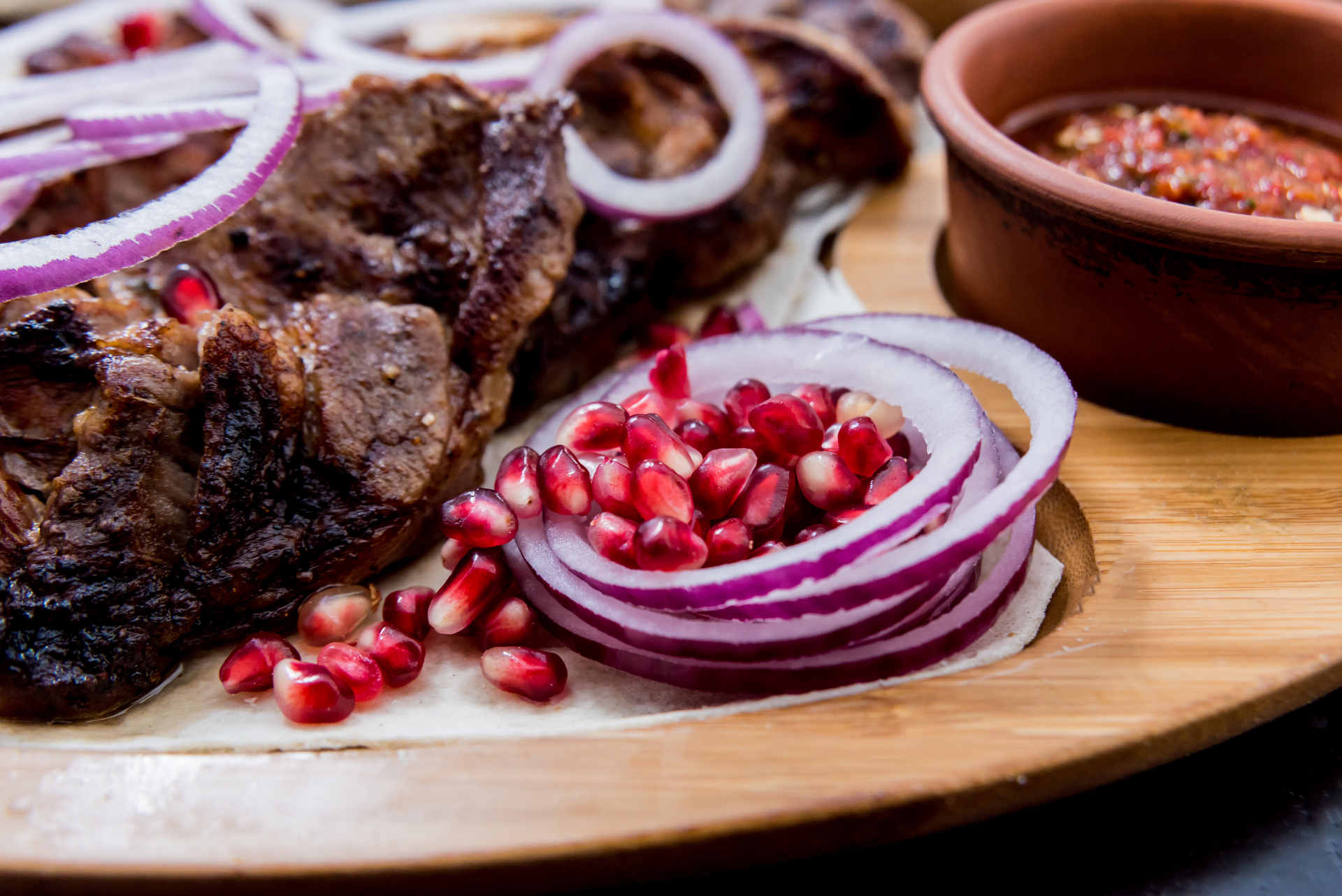 Ethiopian Berbere-Infused Beef Tips with Injera — Main Course served and photographed from above