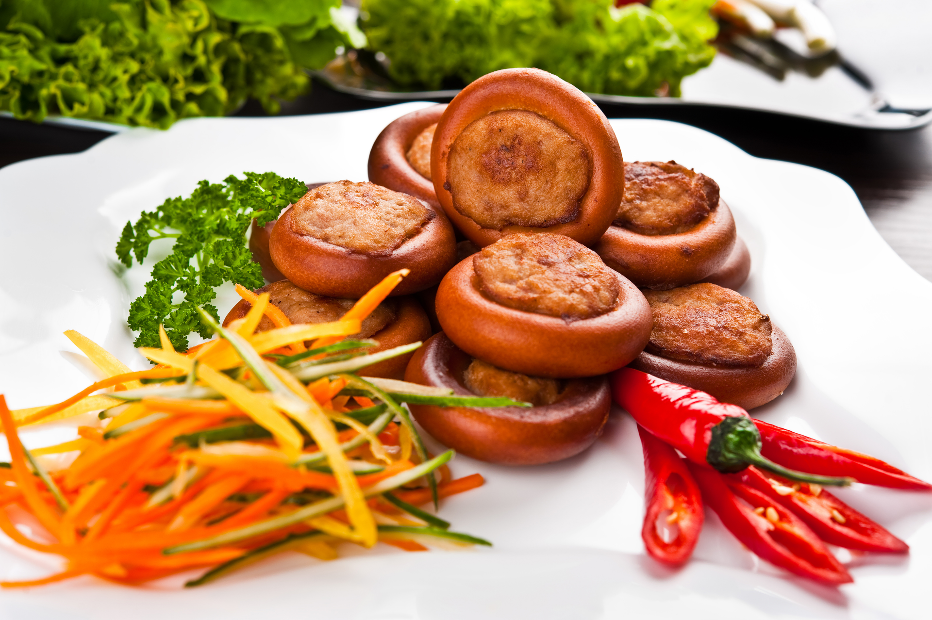 Exotic Balinese Urutan Sausage with Aromatic Spices — Main Course served and photographed from above