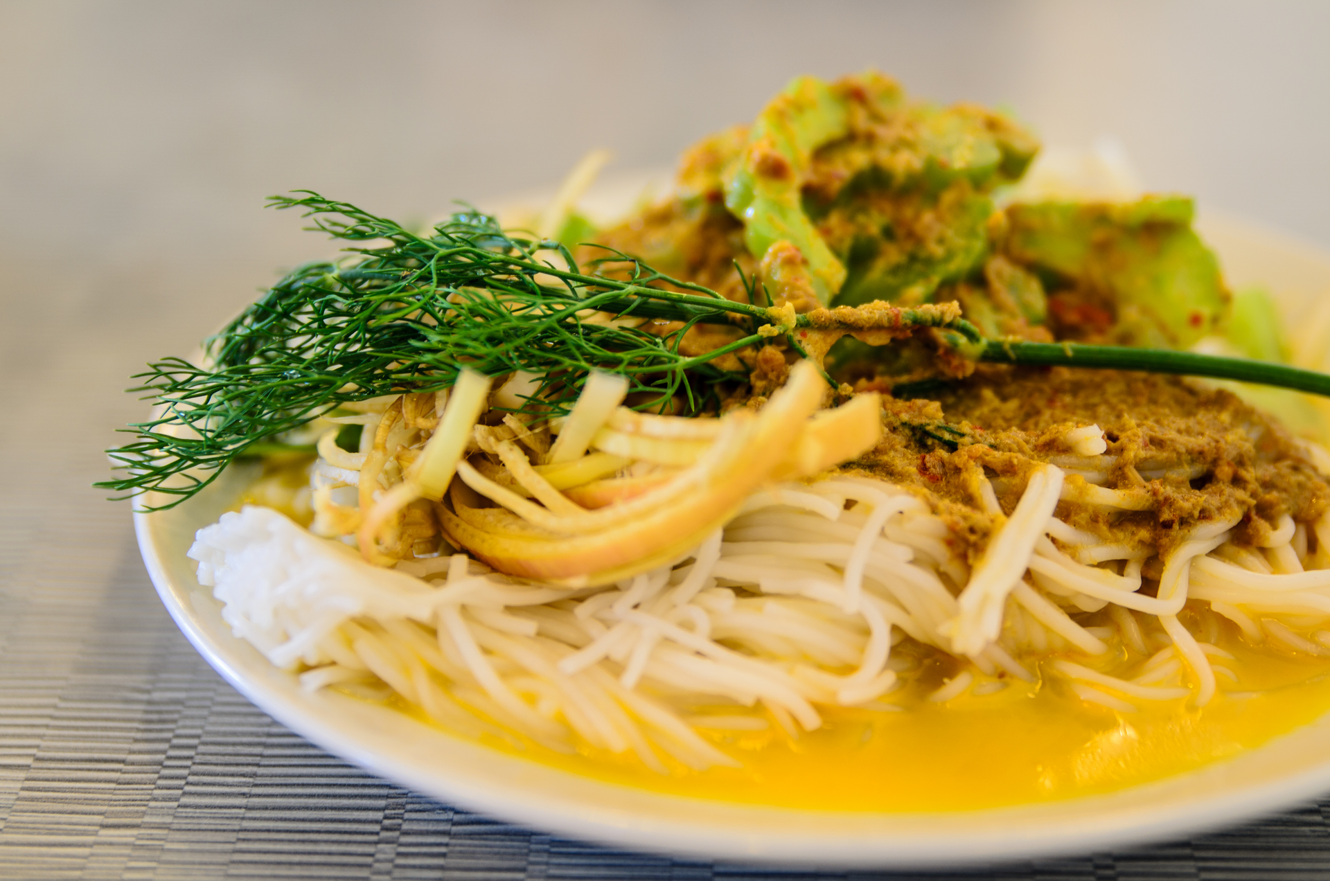 Exotic Burmese Mandalay Noodles with Coconut Curry — Main Course served and photographed from above