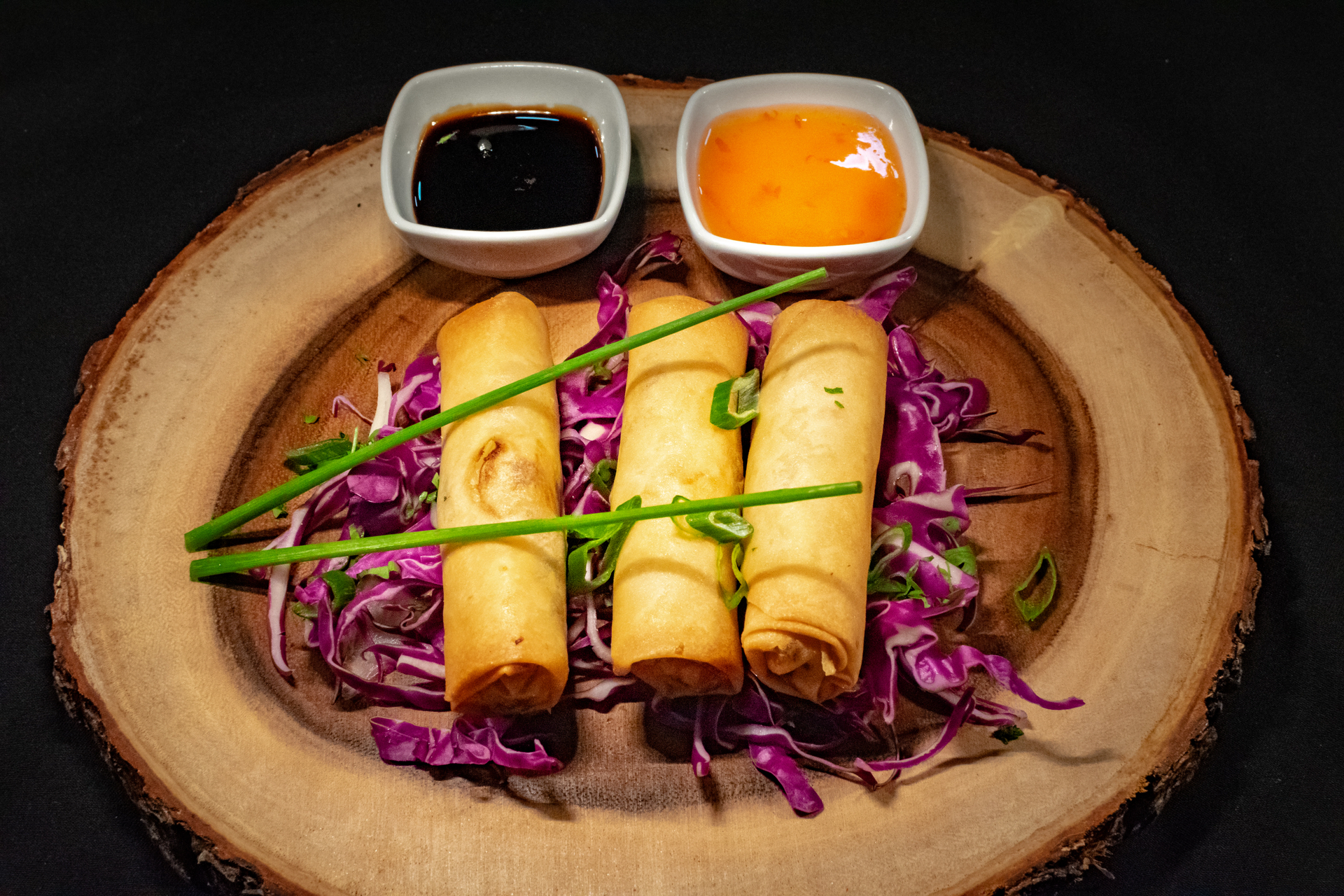 Exotic Filipino Lumpia with Sweet Soy Garlic Sauce — Appetizer served and photographed from above