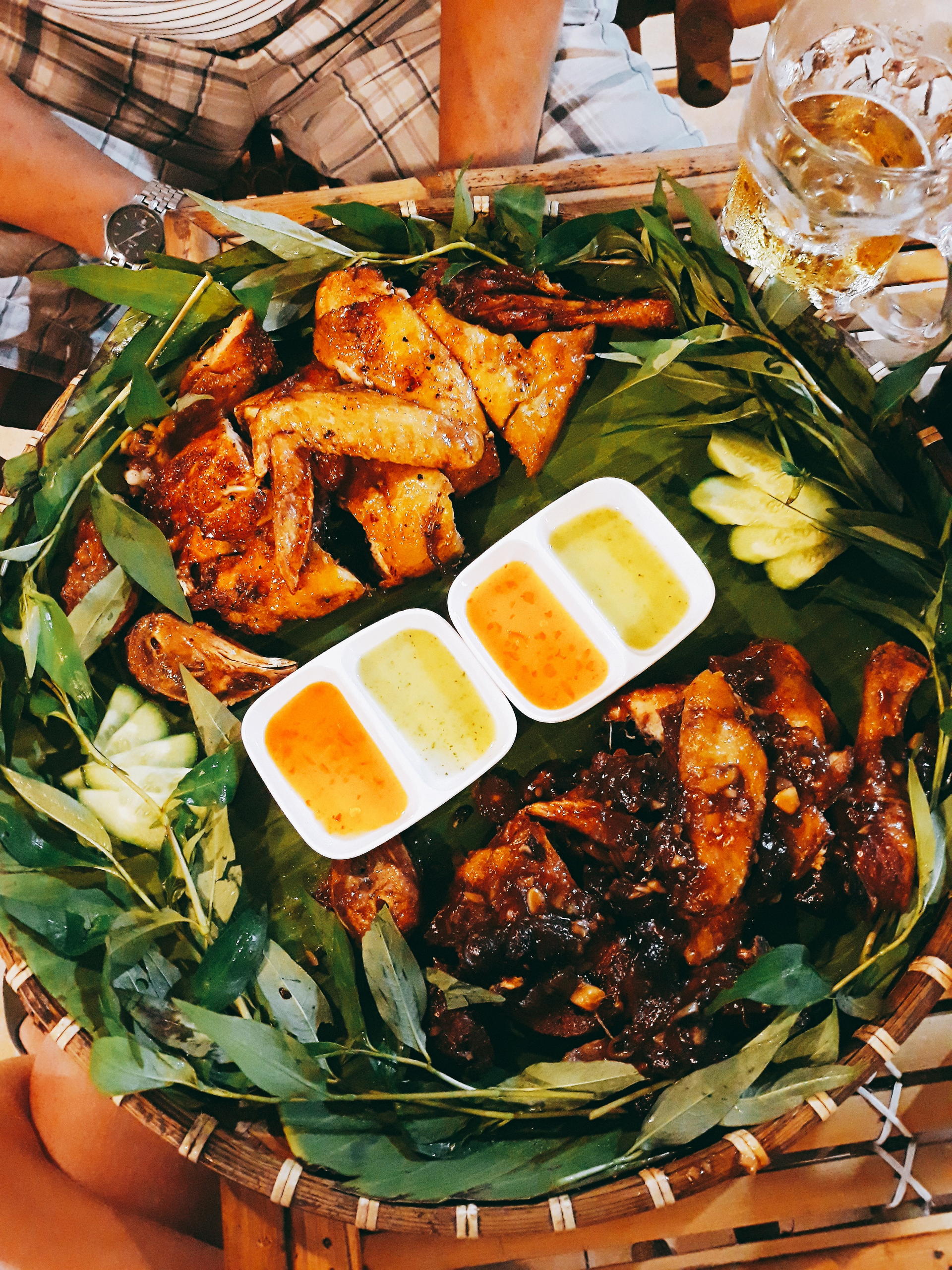 Overhead flat-lay of all ingredients for Exotic Polynesian Chicken Luau with Taro Leaf Sauce laid out on a kitchen surface.
