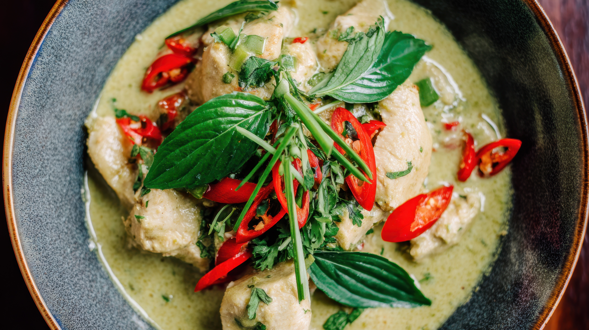 Exotic Thai Green Chicken Curry with Sweet Basil — Main Course served and photographed from above