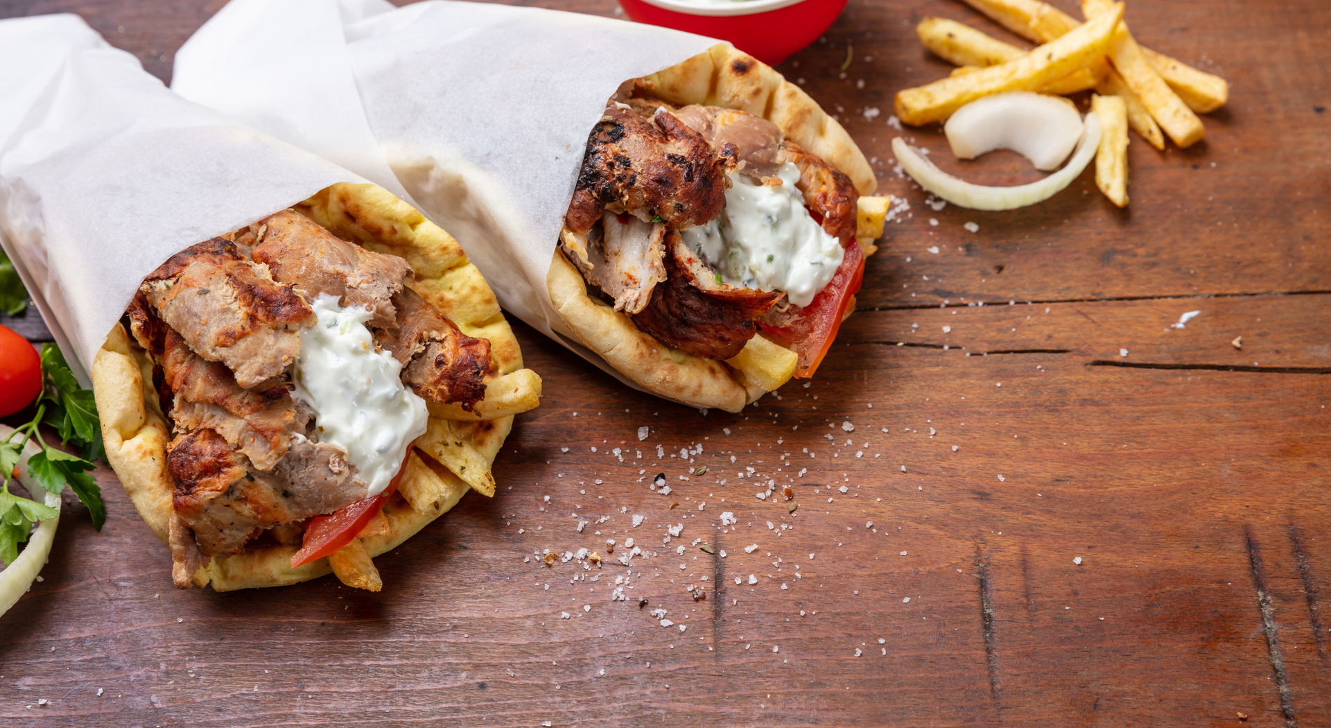 Fiery Greek Chicken Gyros with Feta and Hot Pepper Spread — Main Course served and photographed from above