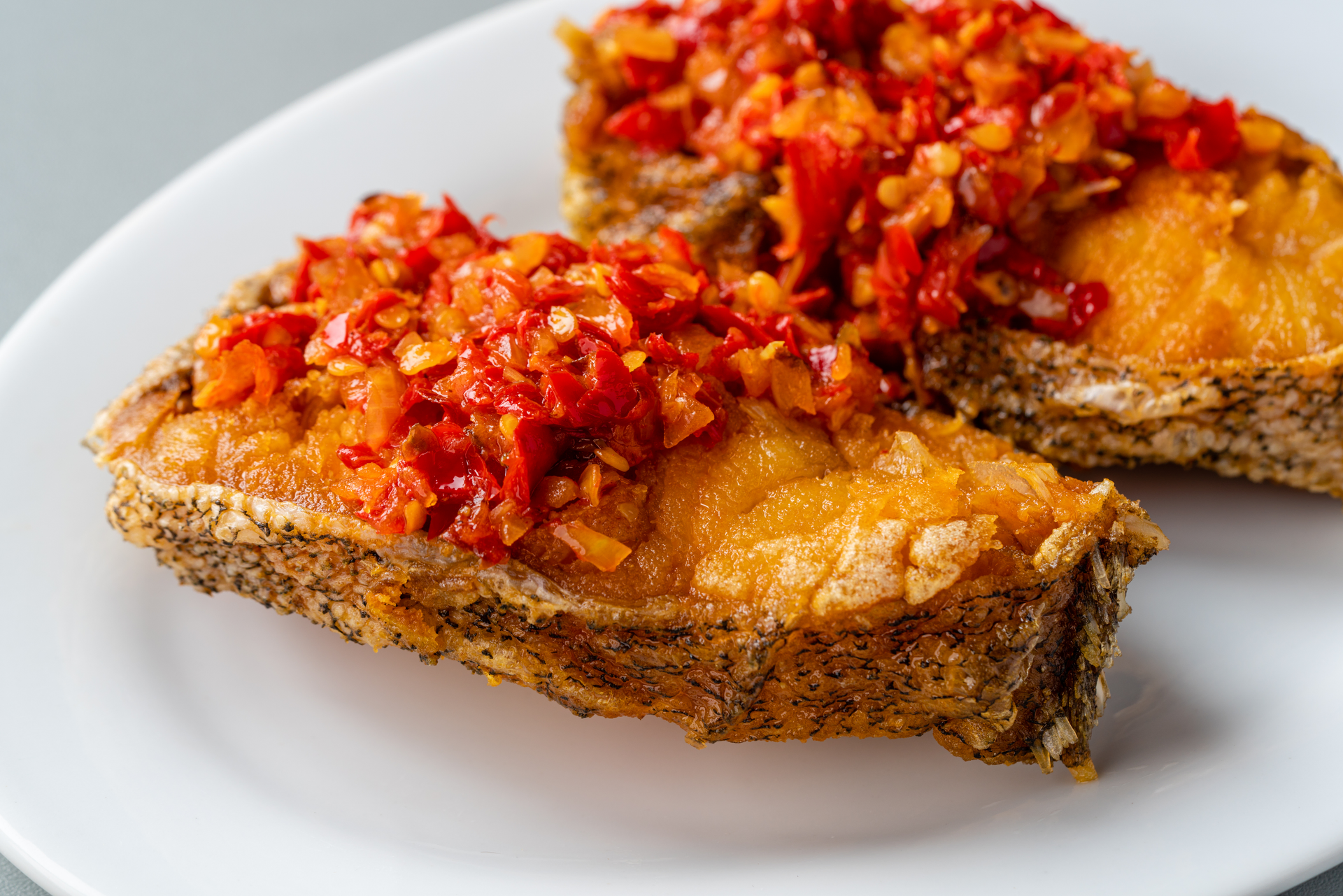 Overhead flat-lay of all ingredients for Fiery Indonesian Sambal Matah Sardine Toasts laid out on a kitchen surface.