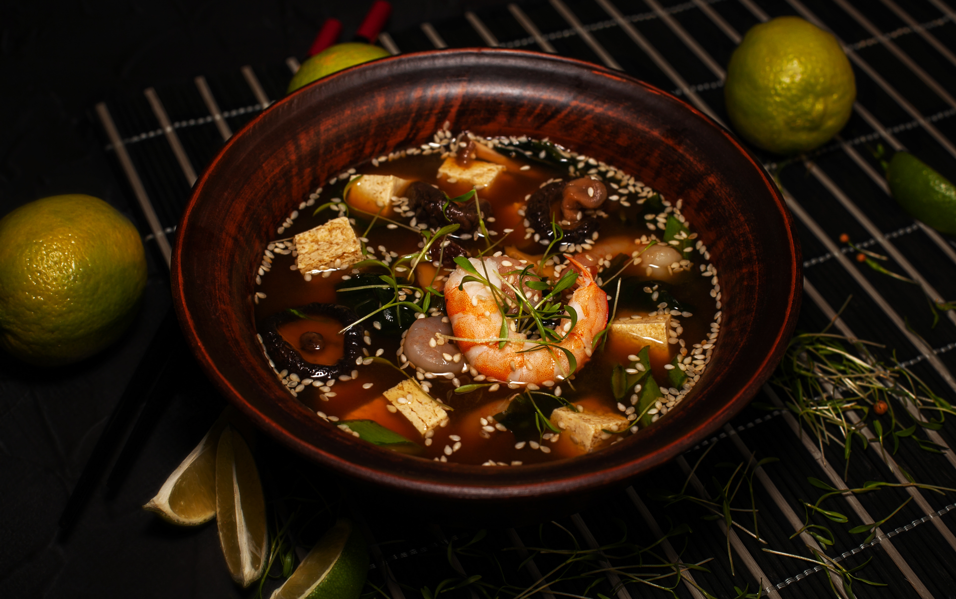 Overhead flat-lay of all ingredients for Fiery Peruvian Rocoto Spiced Seafood Stew laid out on a kitchen surface.