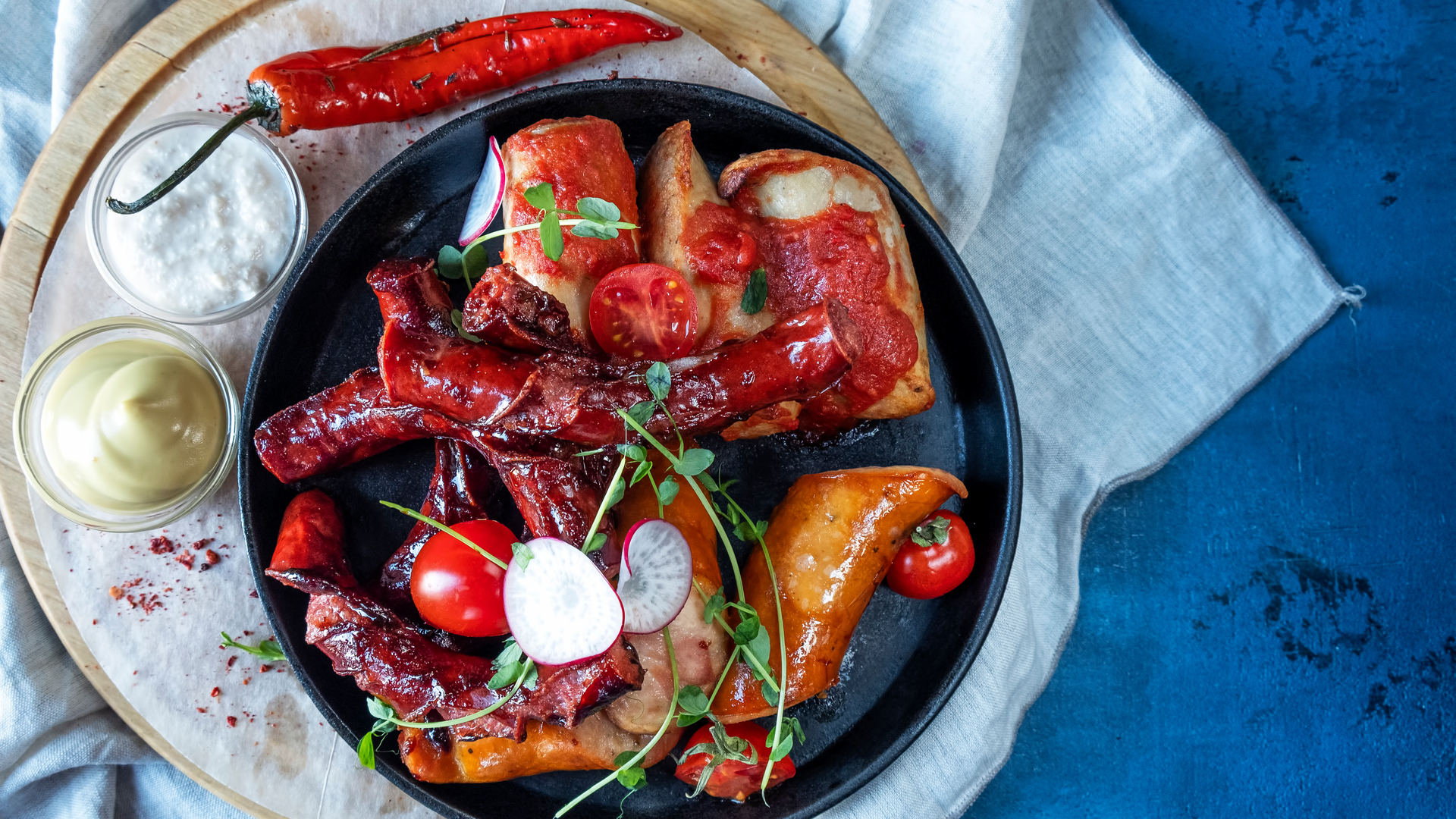 Finnish Lapaset with Smoked Sausage and Lingonberries — Main Course served and photographed from above