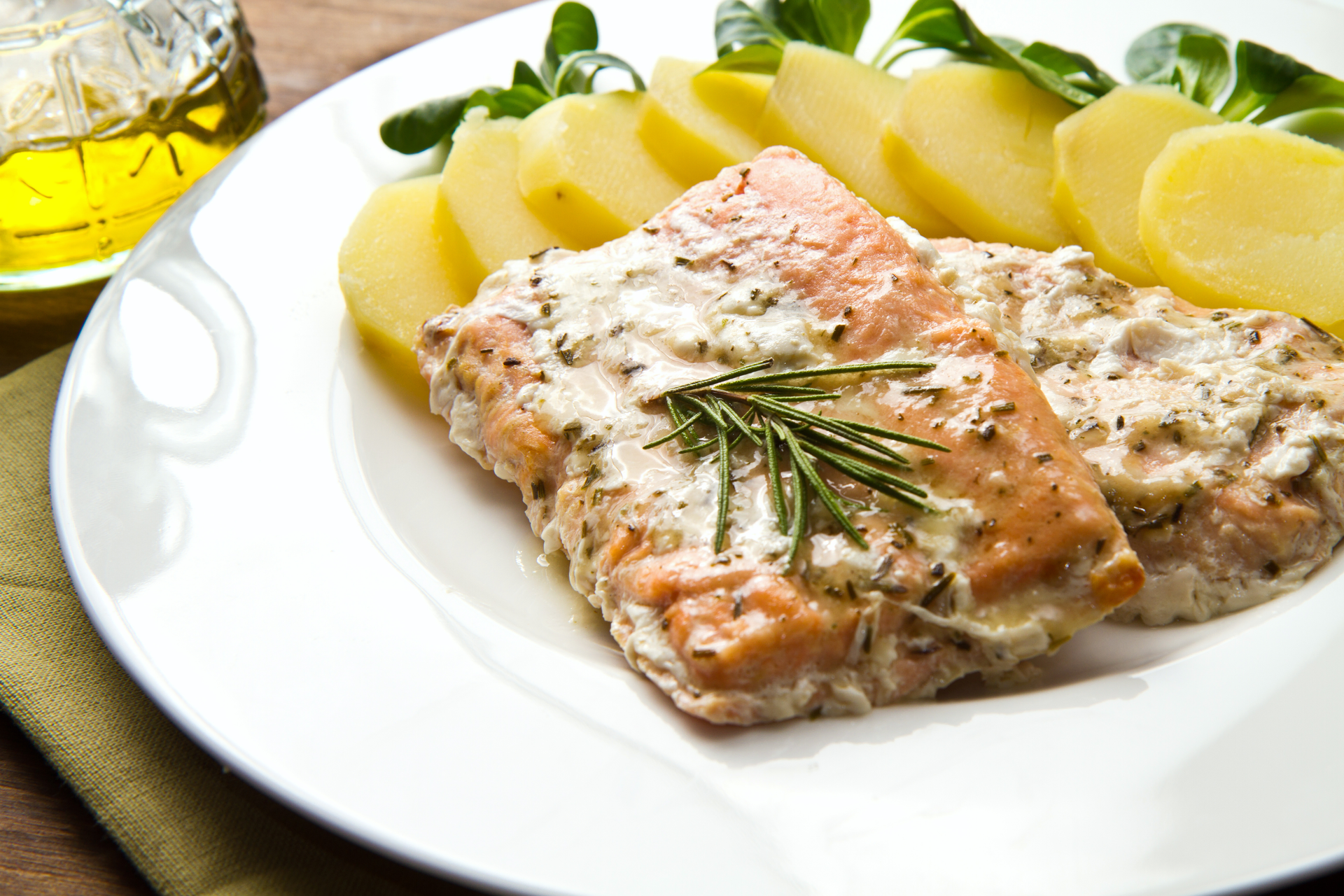 Overhead flat-lay of all ingredients for Finnish Mustard-Crusted Salmon with Dill Cream Sauce laid out on a kitchen surface.