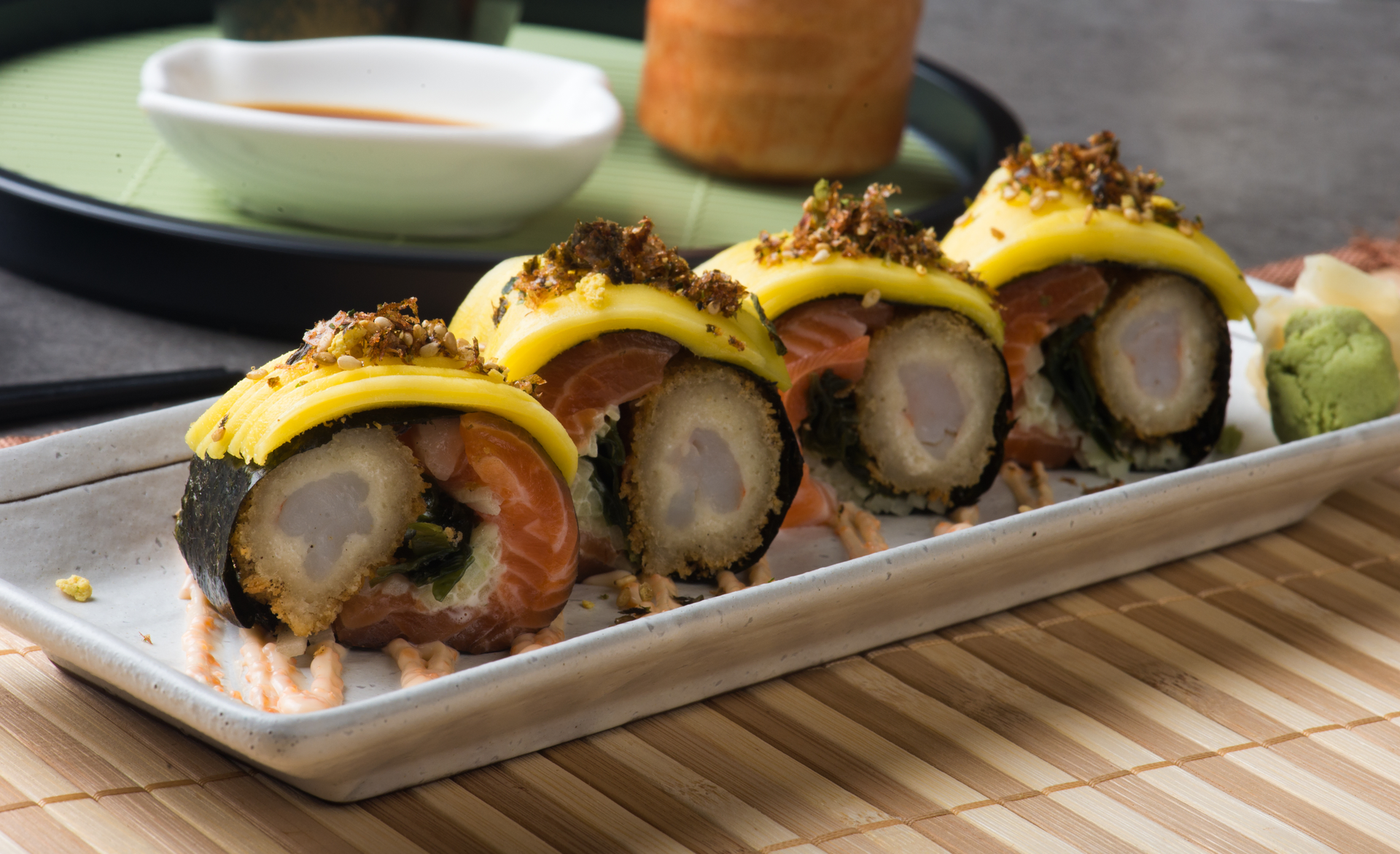 Overhead flat-lay of all ingredients for Flaky Japanese Tamago Sushi with Sweet Soy Glaze laid out on a kitchen surface.