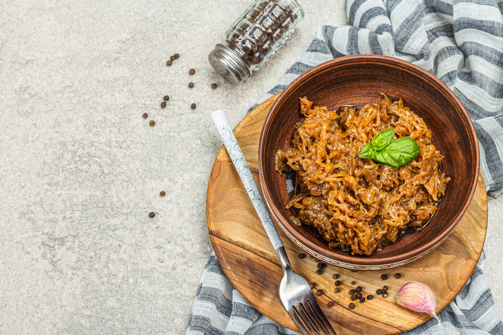 Overhead flat-lay of all ingredients for Flavorsome Lebanese Mujadara with Caramelized Onions laid out on a kitchen surface.