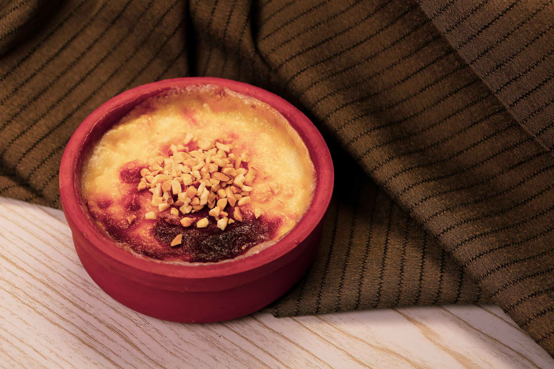 Overhead flat-lay of all ingredients for Fluffy Haitian Akasan Pudding with Warm Spices laid out on a kitchen surface.