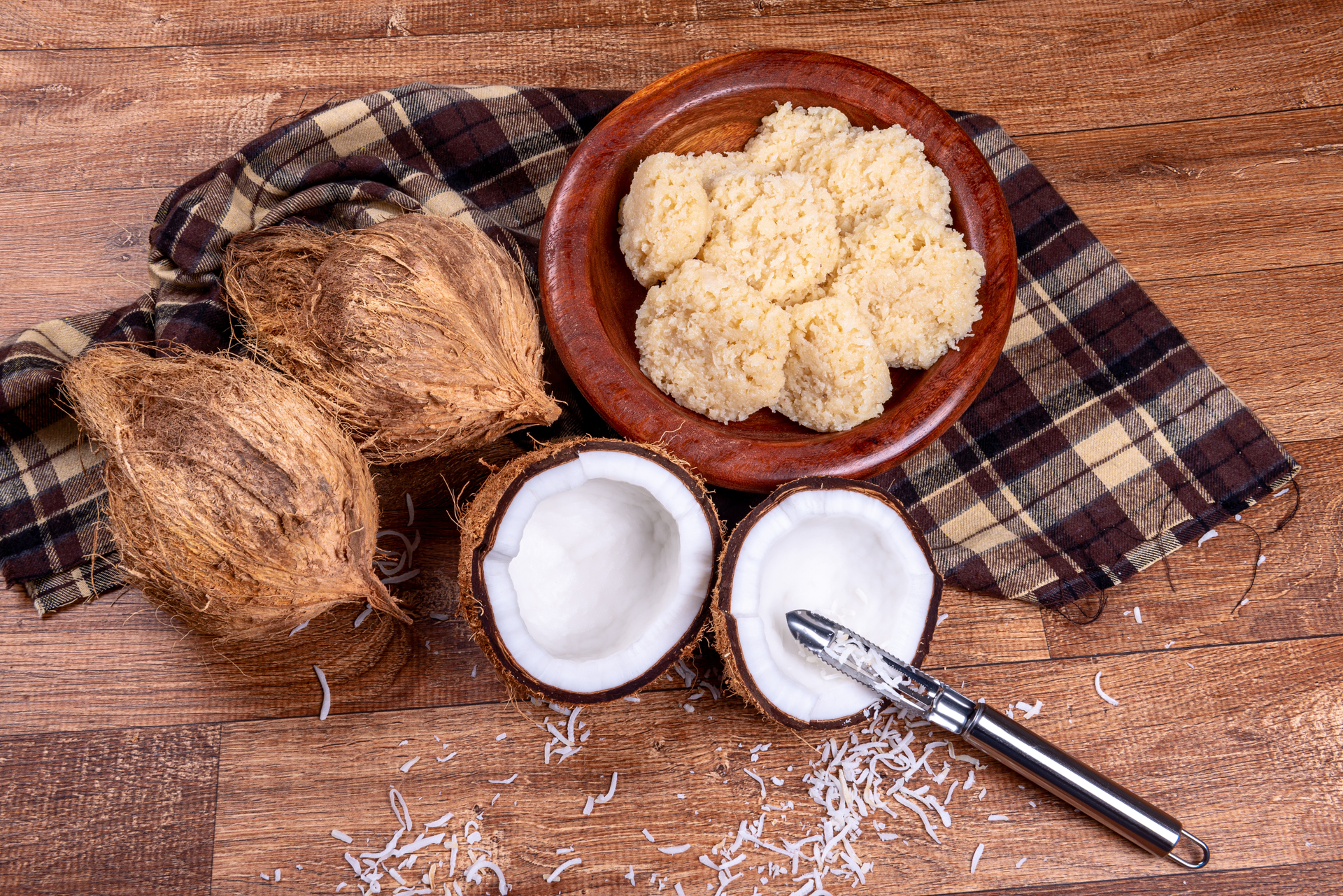 Overhead flat-lay of all ingredients for Fluffy Jamaican Bammy with Coconut Milk Soak laid out on a kitchen surface.