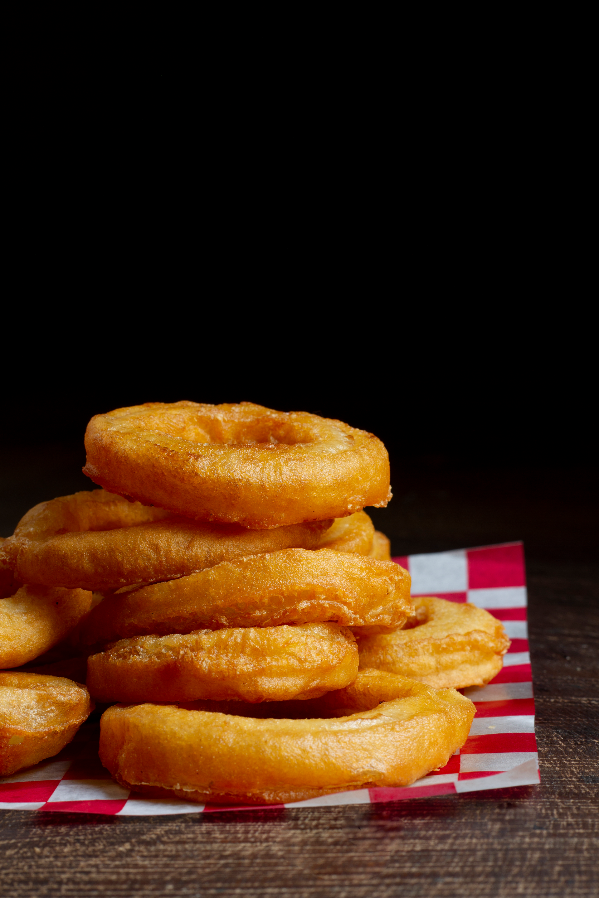 Overhead flat-lay of all ingredients for Fluffy Peruvian Picarones with Spiced Syrup laid out on a kitchen surface.