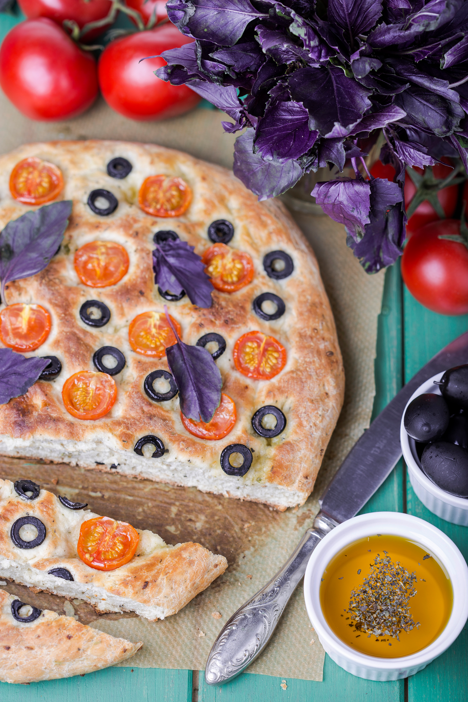 Fluffy Turkish Pogaça with Feta and Black Olives — Appetizer served and photographed from above