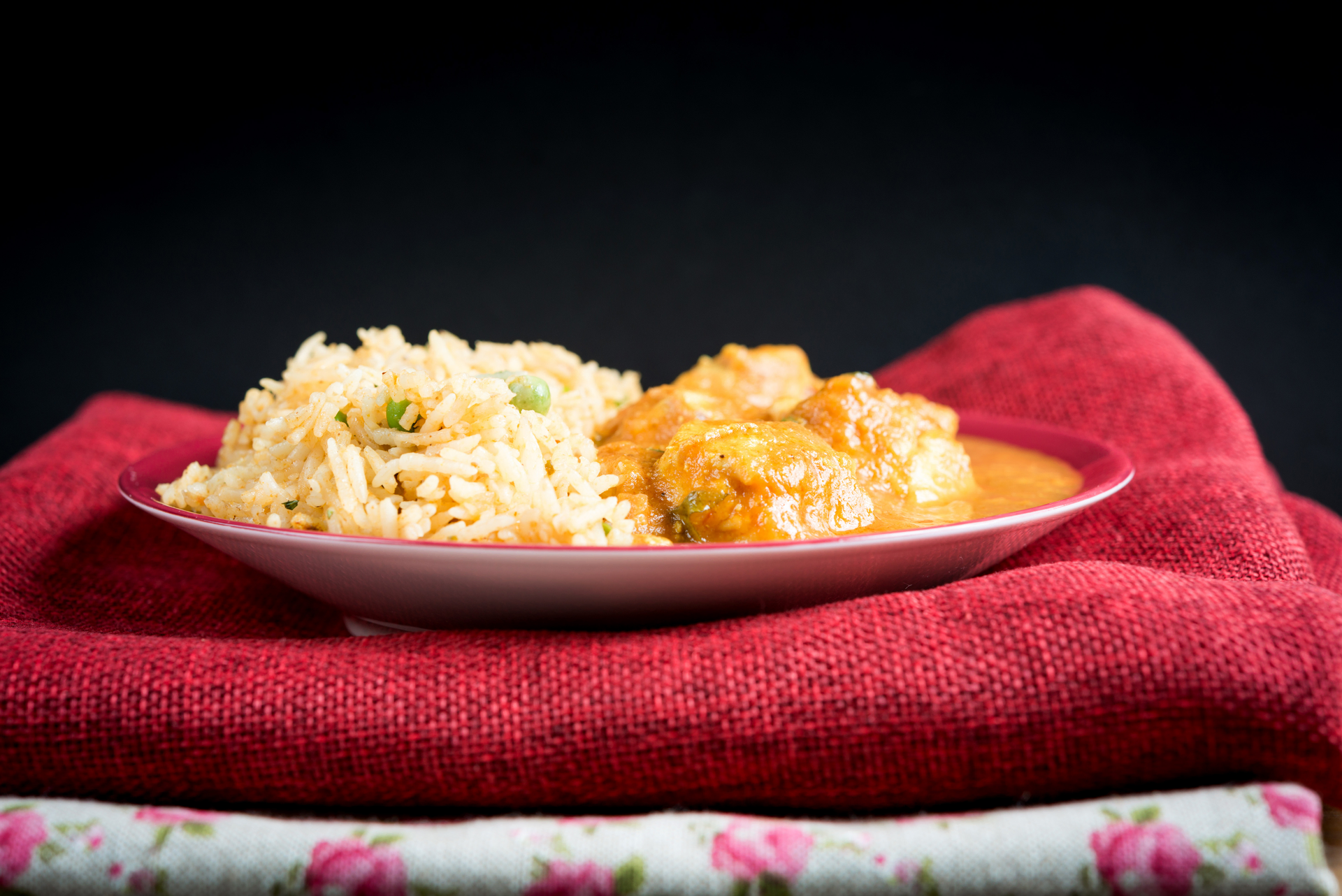 Overhead flat-lay of all ingredients for Fragrant Indian Hyderabadi Biryani with Saffron laid out on a kitchen surface.