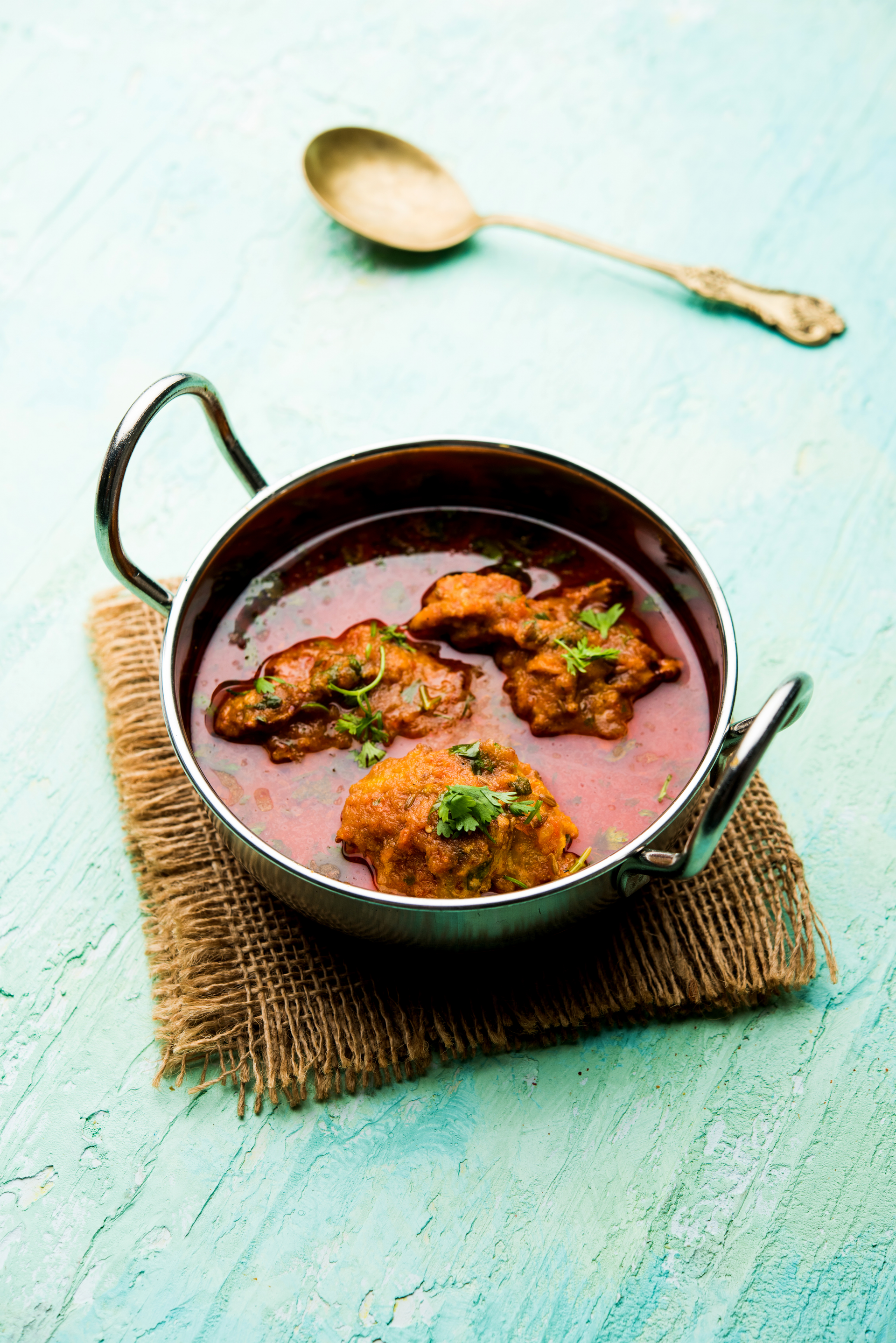 Fragrant Indian Sambar with Drumsticks and Tamarind — Main Course served and photographed from above