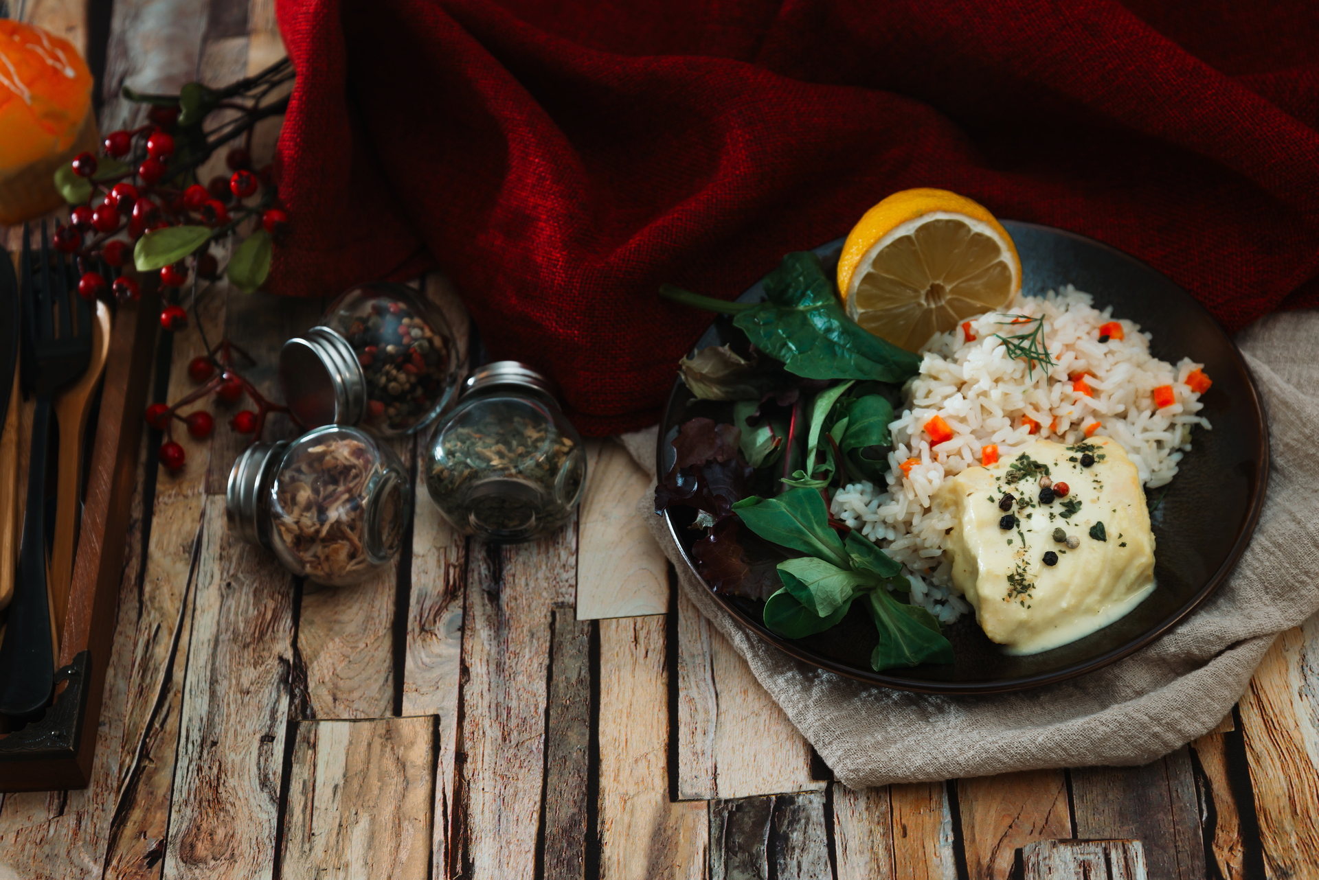 Overhead flat-lay of all ingredients for Fragrant Malaysian Nasi Tomato with Star Anise and Cloves laid out on a kitchen surface.