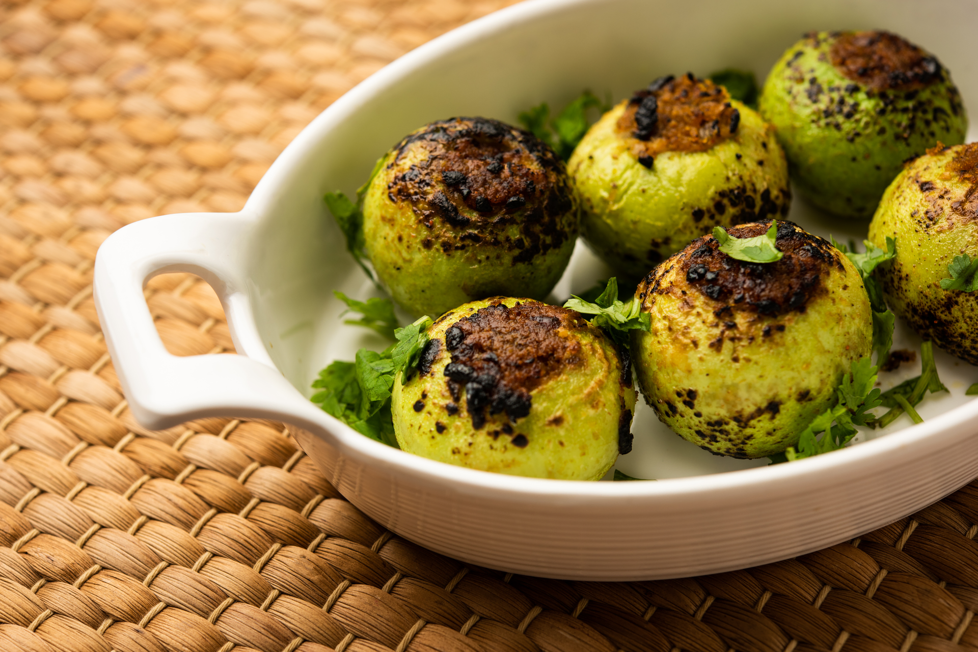 Overhead flat-lay of all ingredients for Fragrant Mauritian Boulettes with Chayote and Garlic Sauce laid out on a kitchen surface.