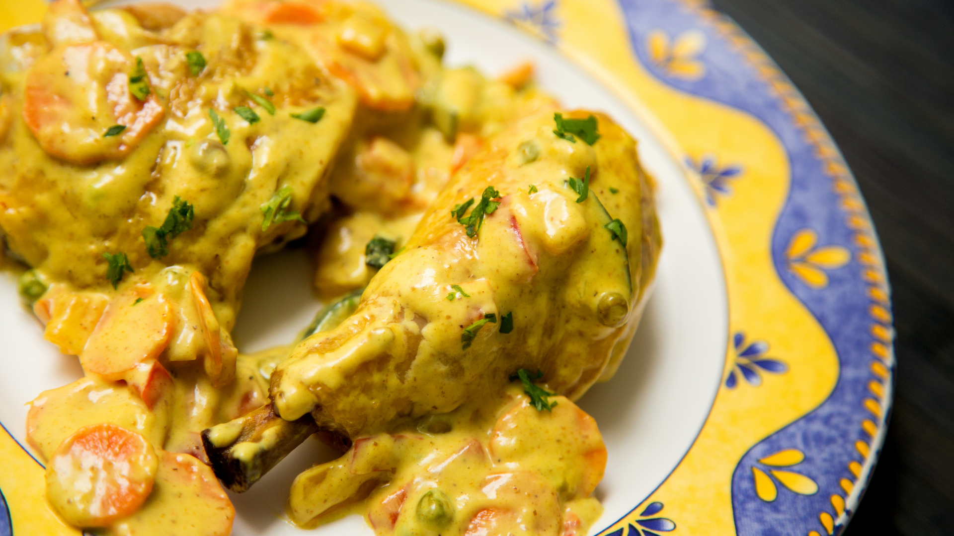 Fragrant Moroccan Chicken M'hammar with Saffron — Main Course served and photographed from above