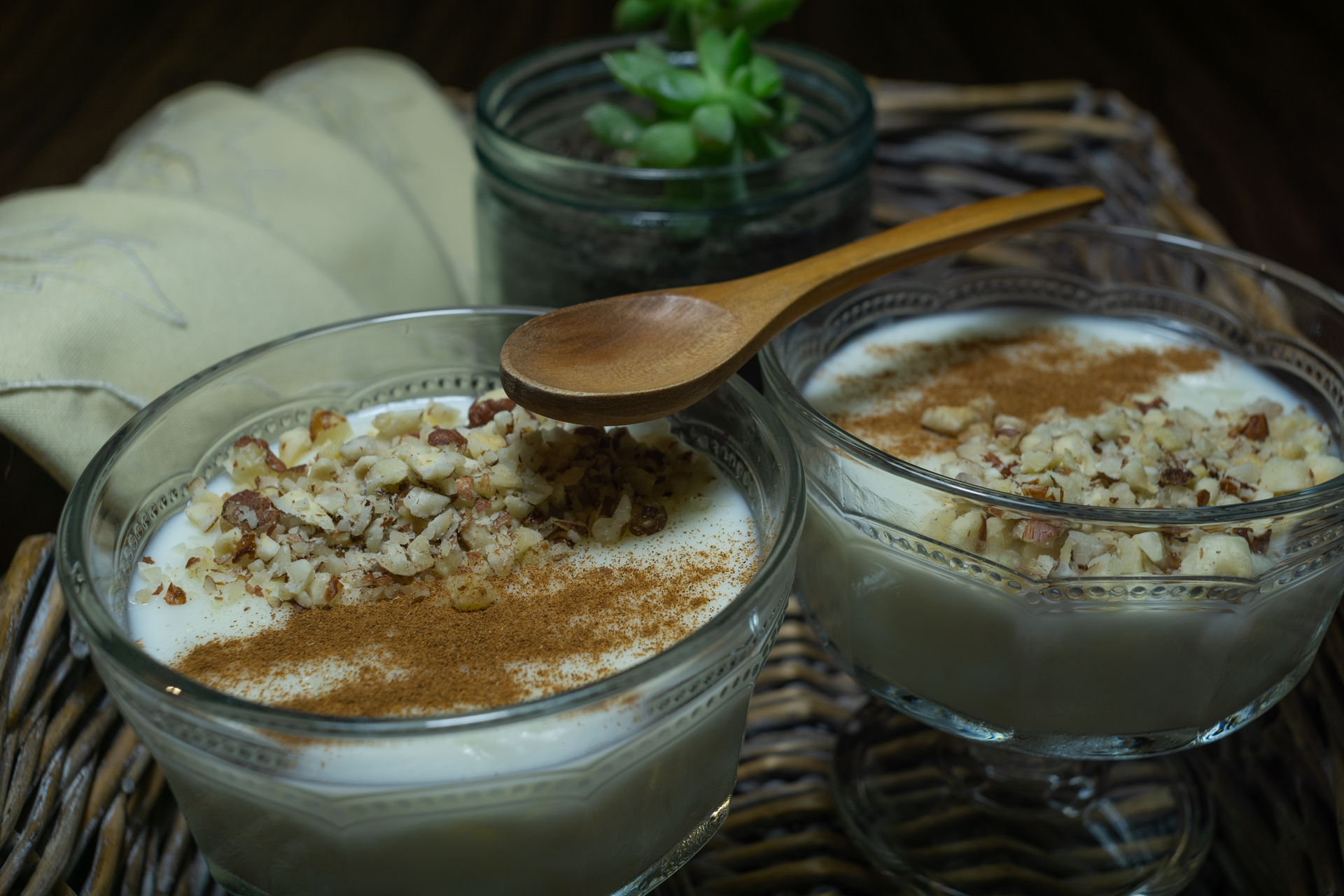 Overhead flat-lay of all ingredients for Fragrant Pakistani Cardamom Kheer with Fig Compote laid out on a kitchen surface.