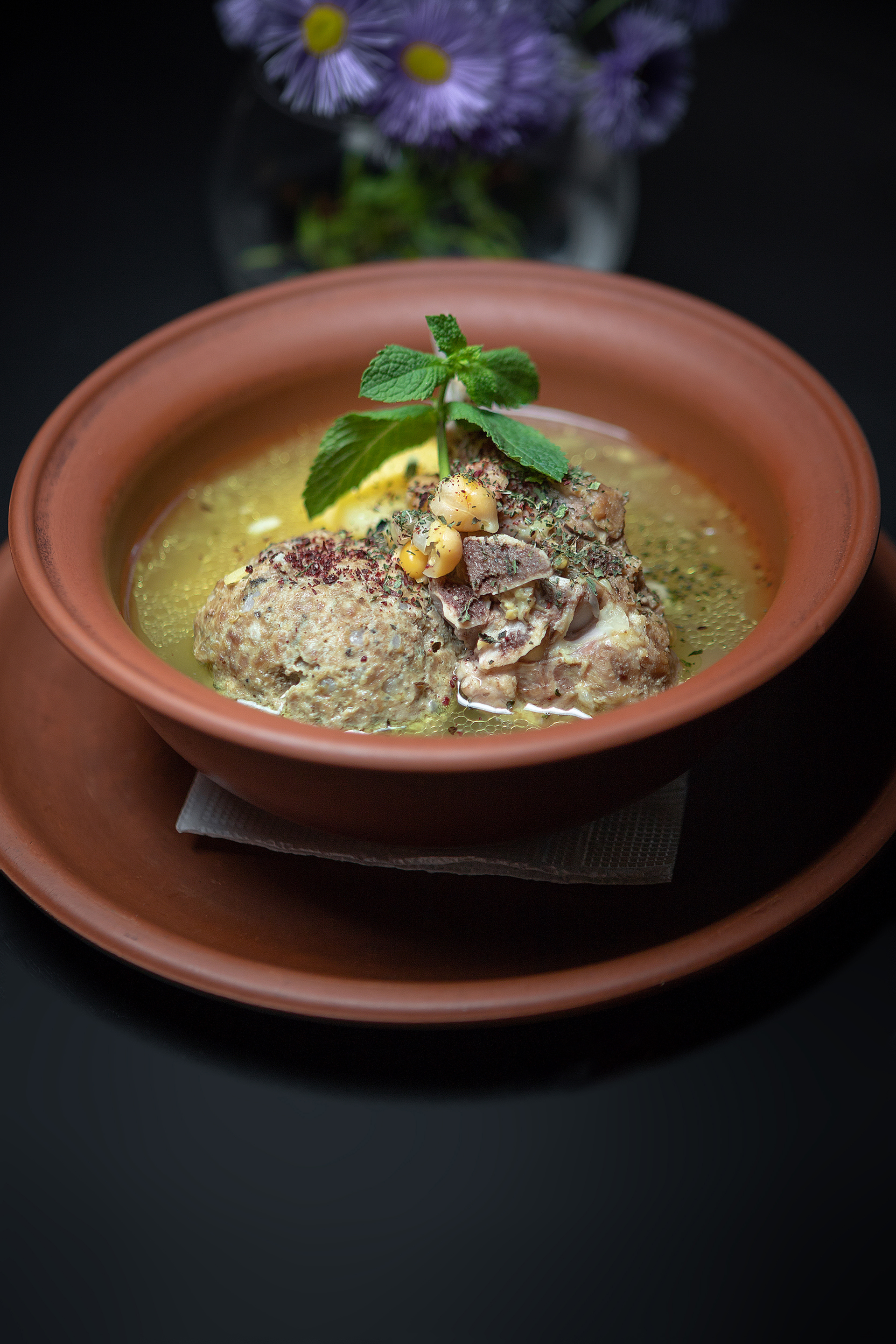 Overhead flat-lay of all ingredients for Fragrant Peruvian Aguadito de Pollo with Cilantro Broth laid out on a kitchen surface.