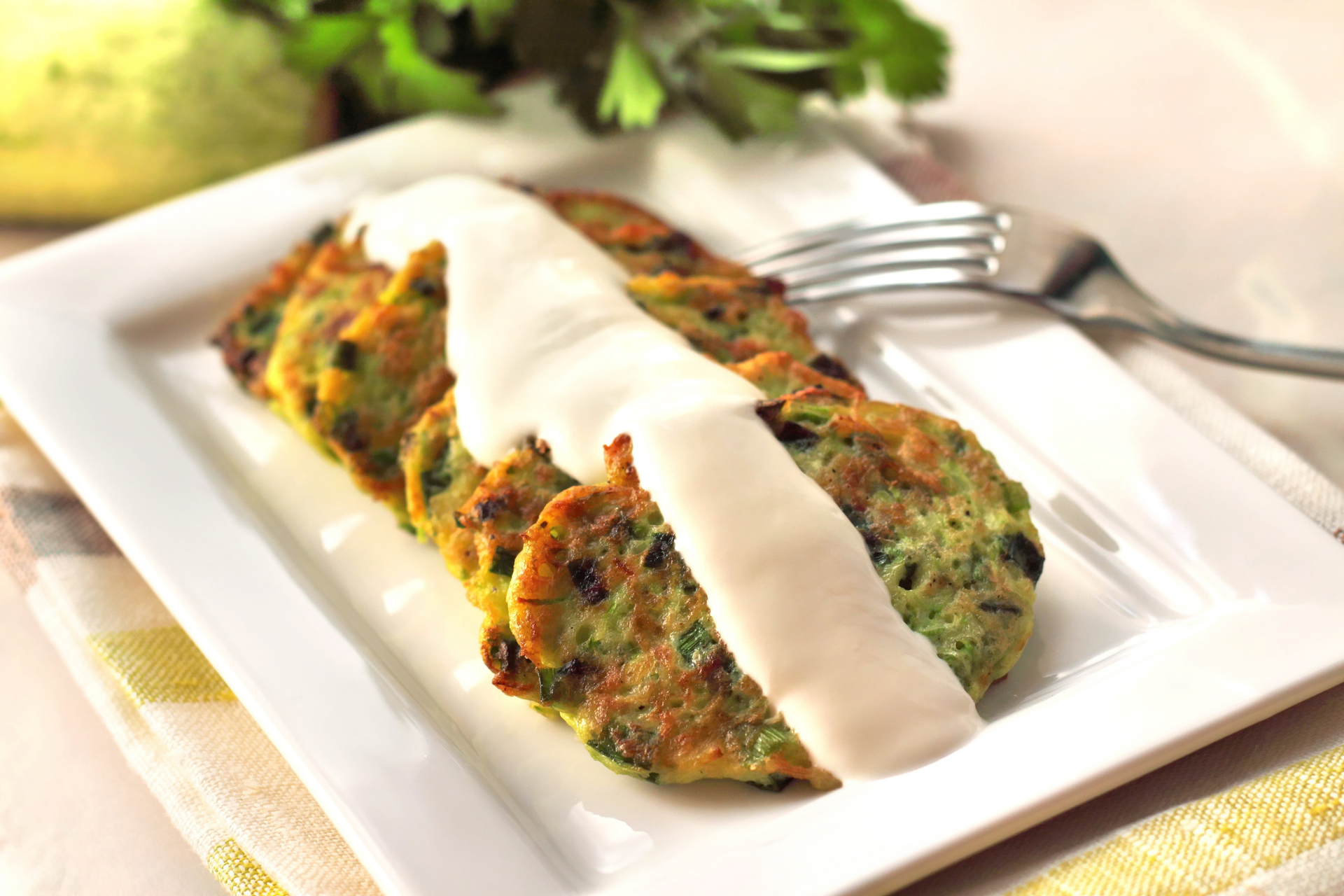Fragrant Tunisian Lablabi with Coriander Yogurt Drizzle — Soup served and photographed from above