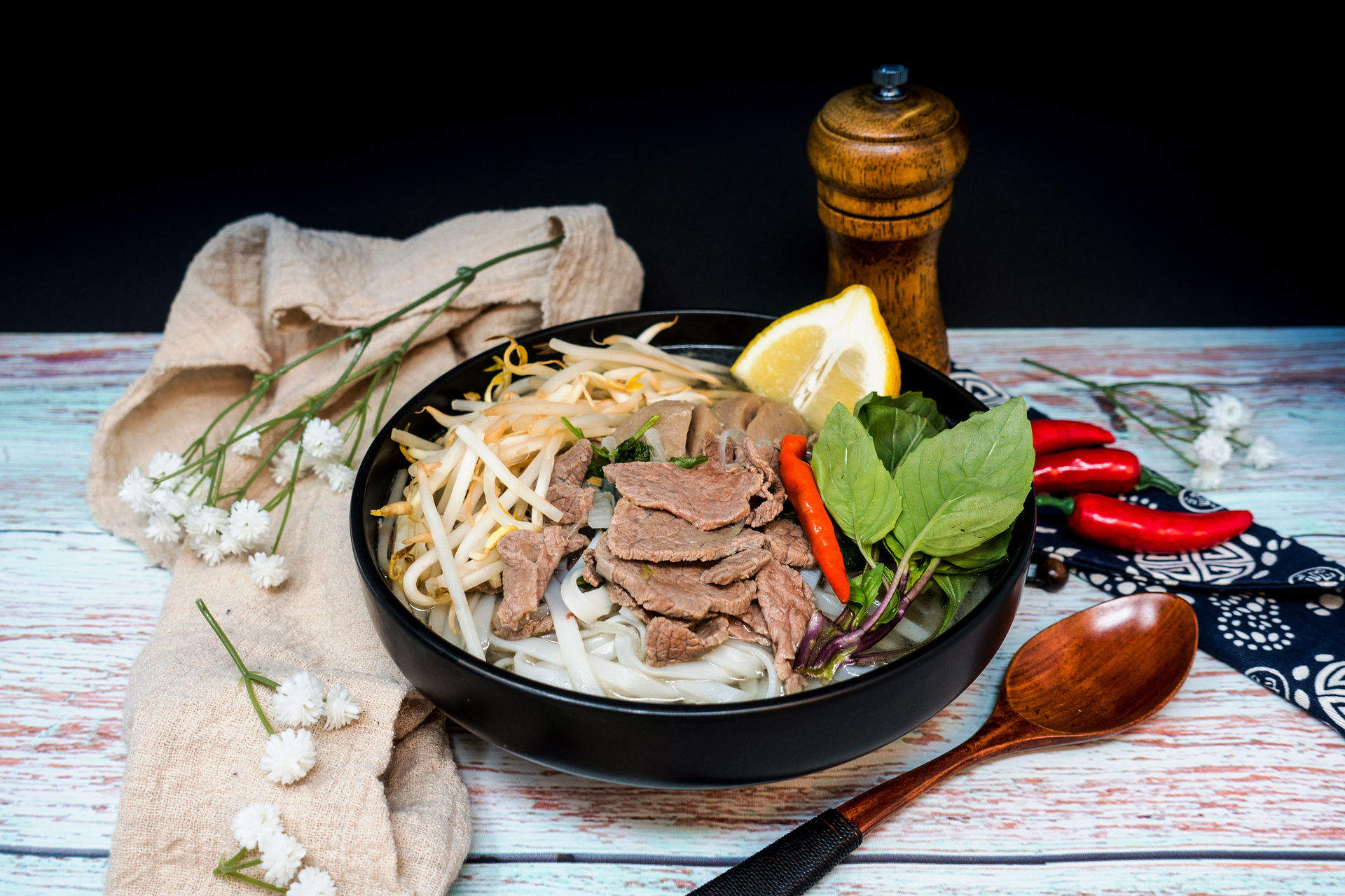 Fragrant Vietnamese Cao Lau with Pork and Herbs — Main Course served and photographed from above