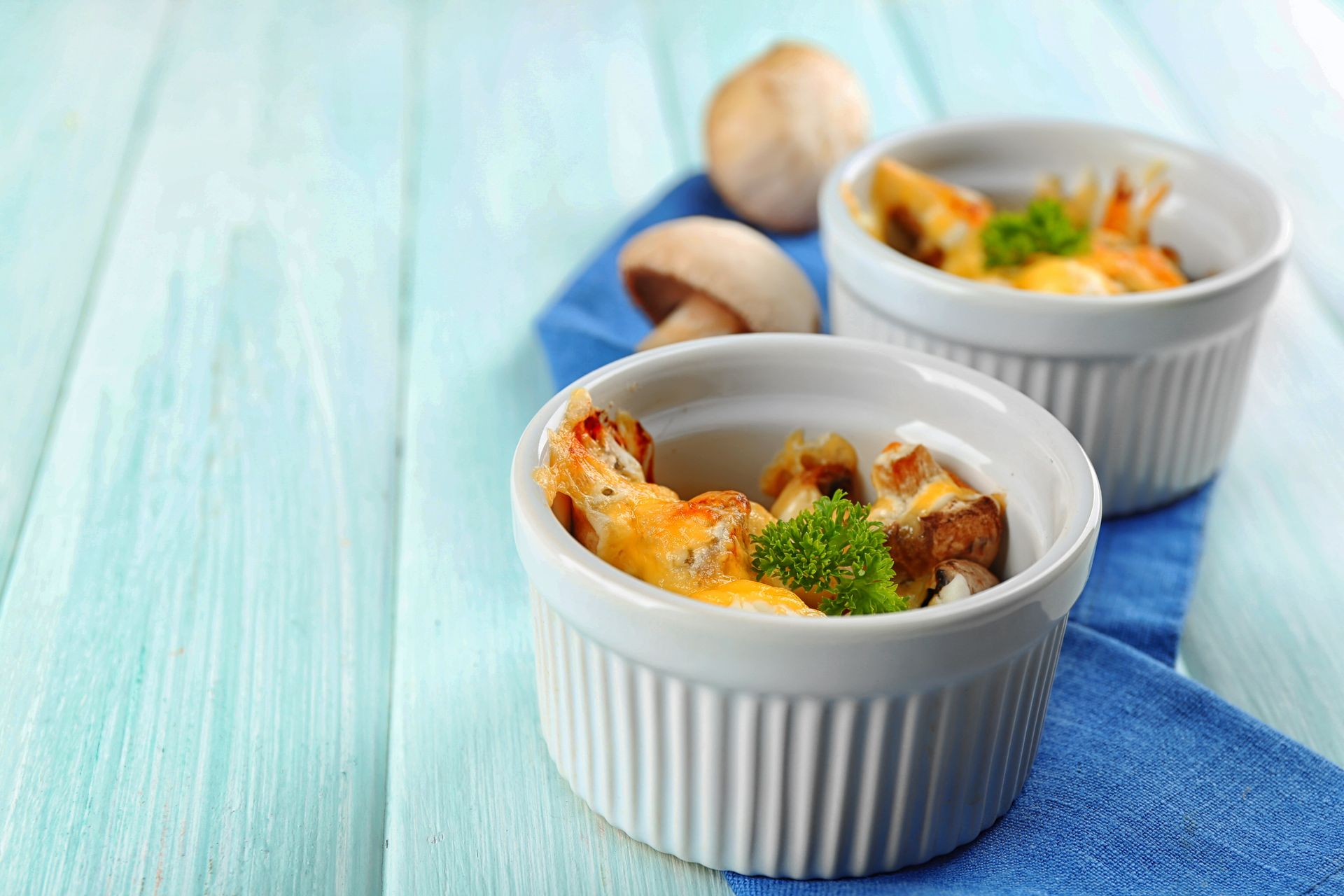Overhead flat-lay of all ingredients for French Bouchées à la Reine with Chicken and Mushrooms laid out on a kitchen surface.