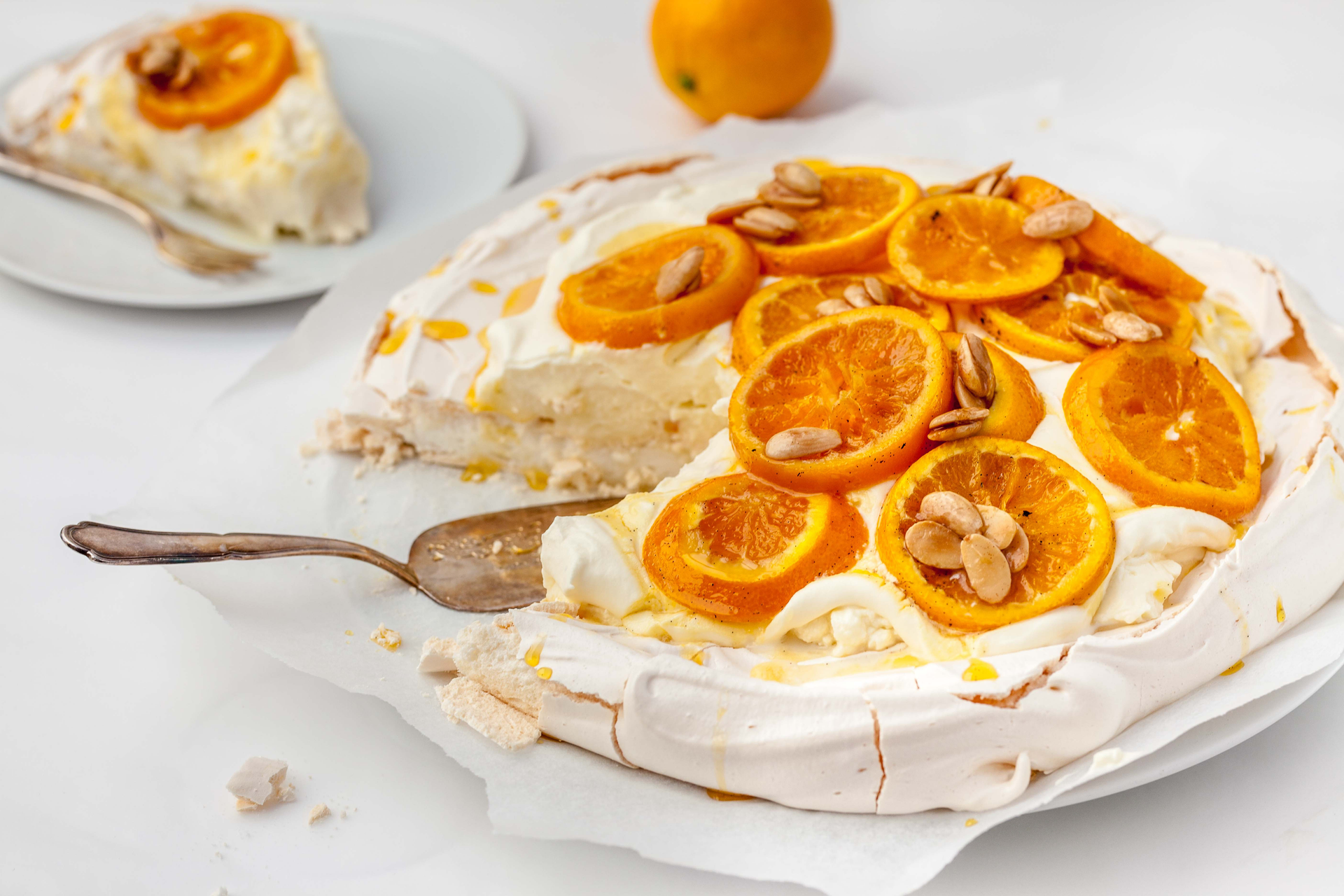 Overhead flat-lay of all ingredients for French Tarte Tropézienne with Orange Blossom Cream laid out on a kitchen surface.