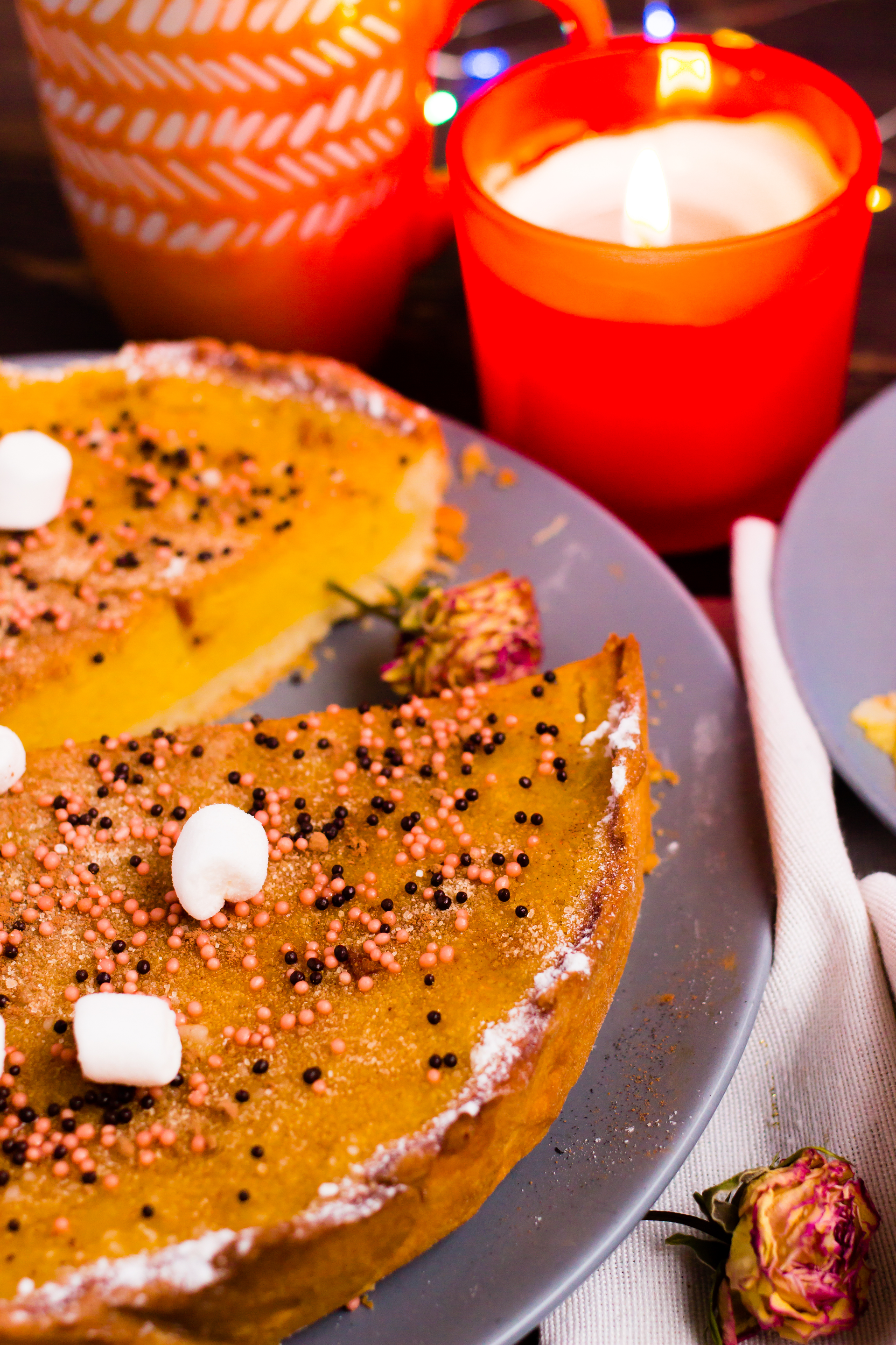 Overhead flat-lay of all ingredients for Glazed Tunisian Cardamom Orange Cake with Honey Syrup laid out on a kitchen surface.