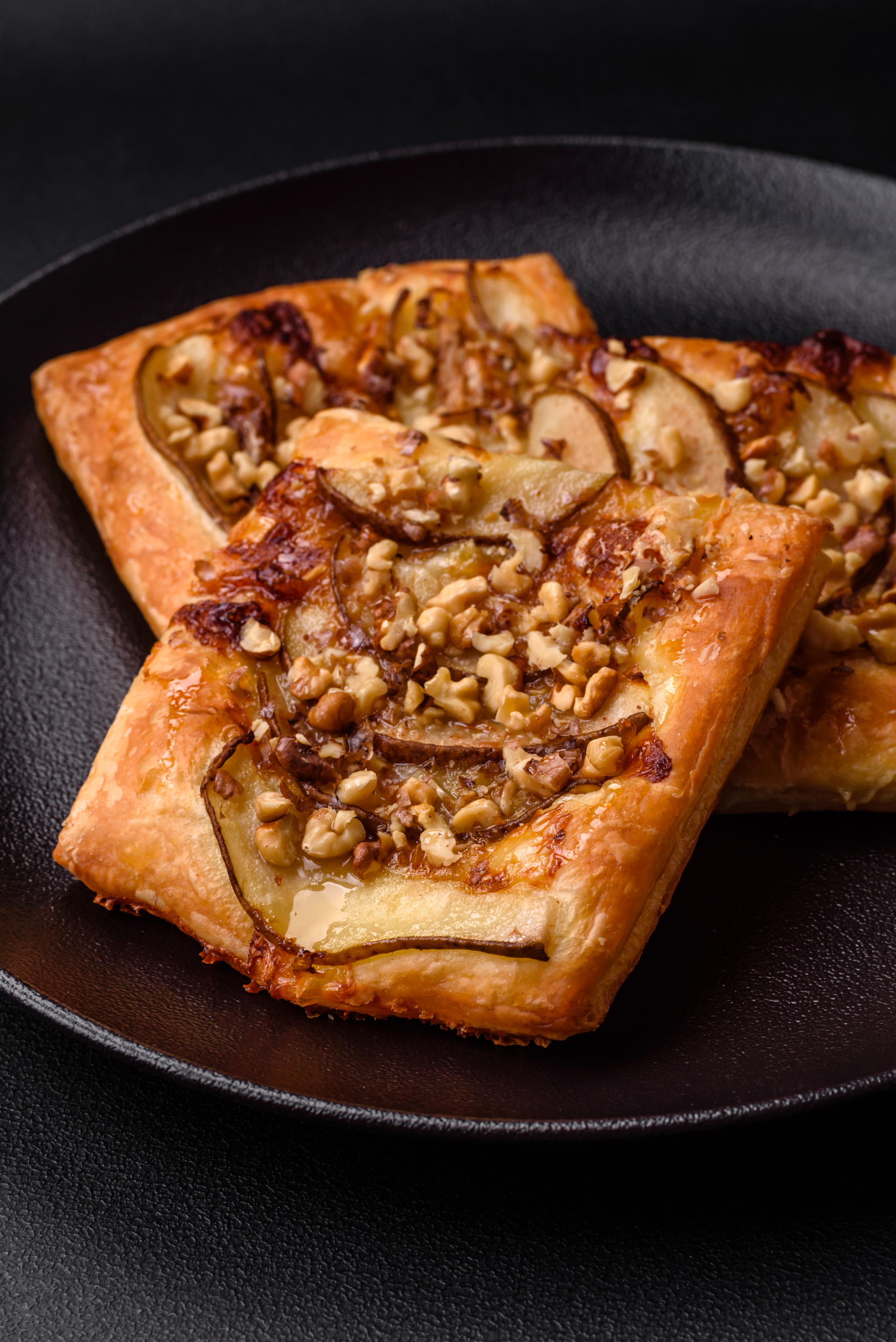 Overhead flat-lay of all ingredients for Golden Armenian Gata with Walnut Filling and Honey Drizzle laid out on a kitchen surface.