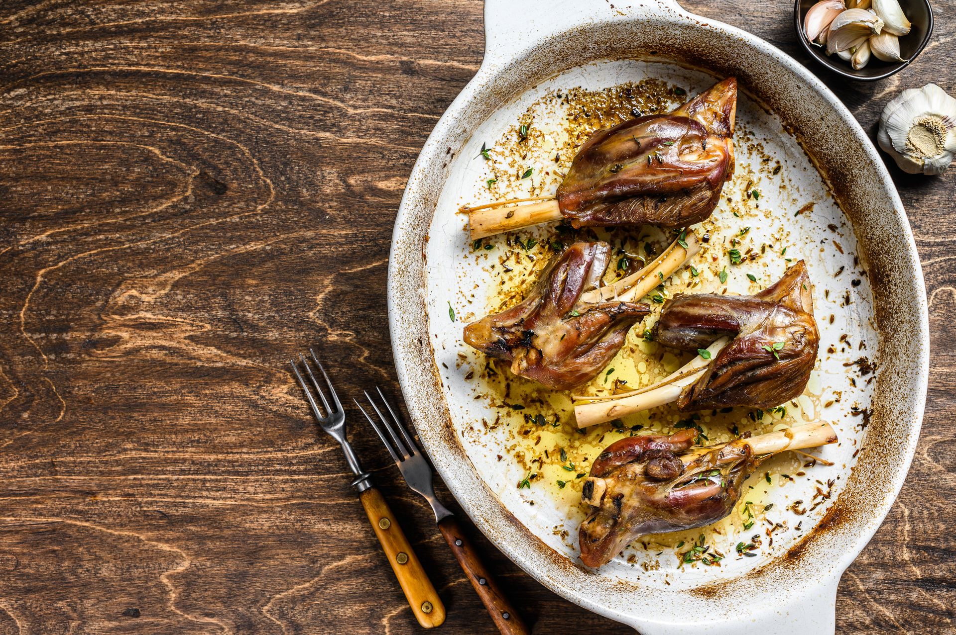 Overhead flat-lay of all ingredients for Golden Moroccan Saffron Lamb with Caramelized Onions laid out on a kitchen surface.