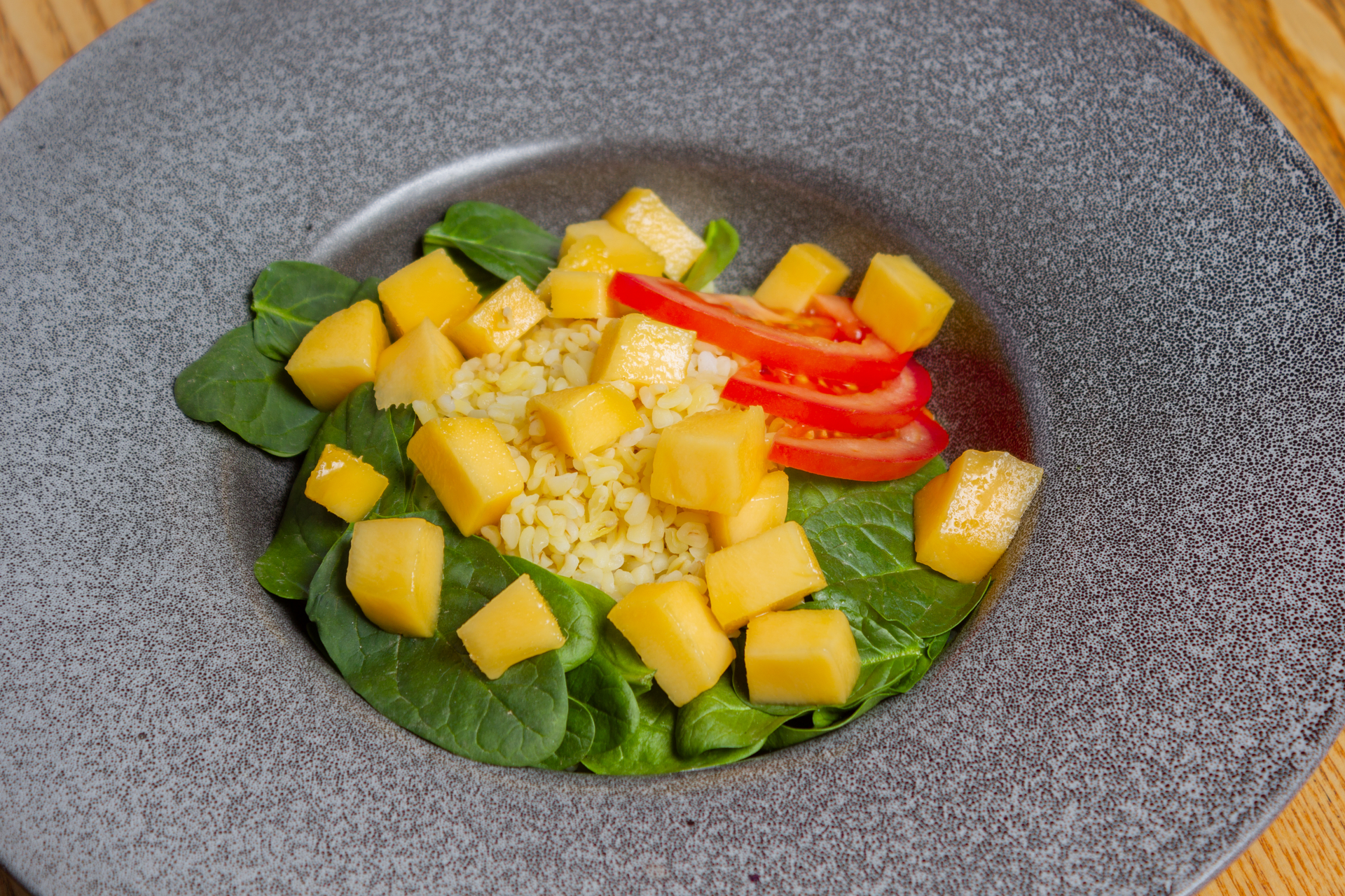 Overhead flat-lay of all ingredients for Golden Thai Pineapple Curry with Kaffir Lime and Tofu laid out on a kitchen surface.