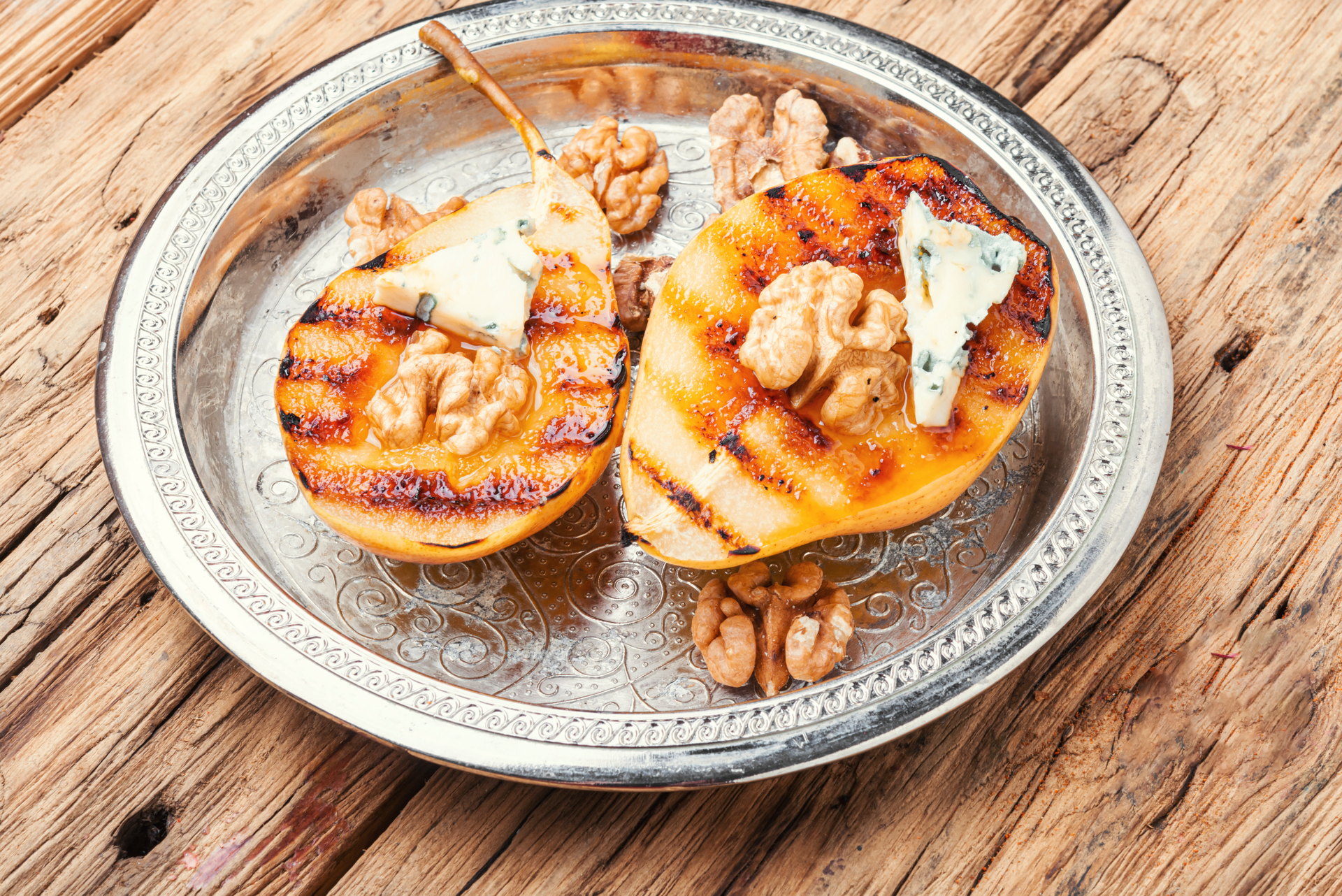 Overhead flat-lay of all ingredients for Greek Halloumi Saganaki with Honey and Walnuts laid out on a kitchen surface.
