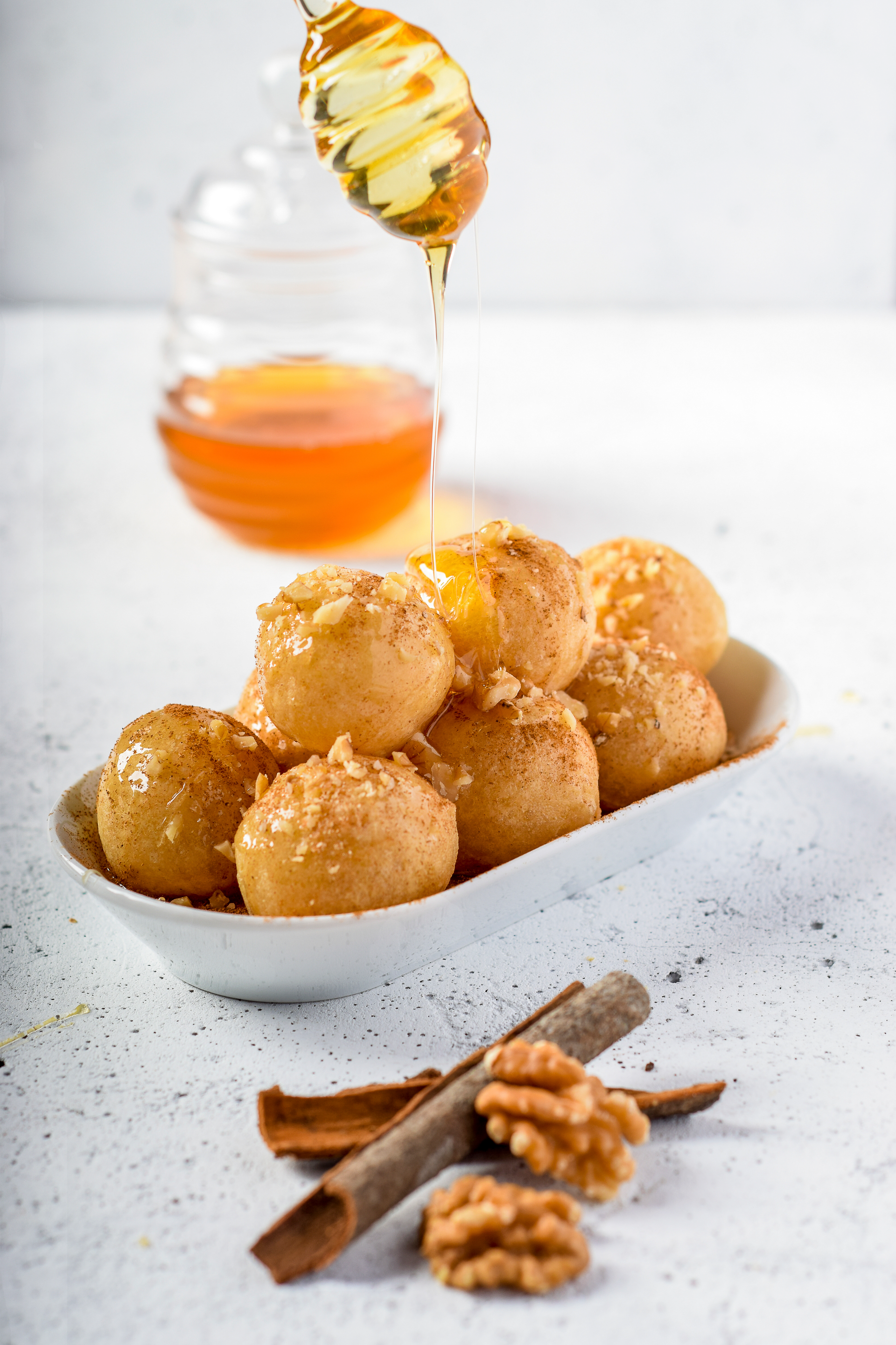 Greek Loukoumades with Honey Syrup and Walnuts