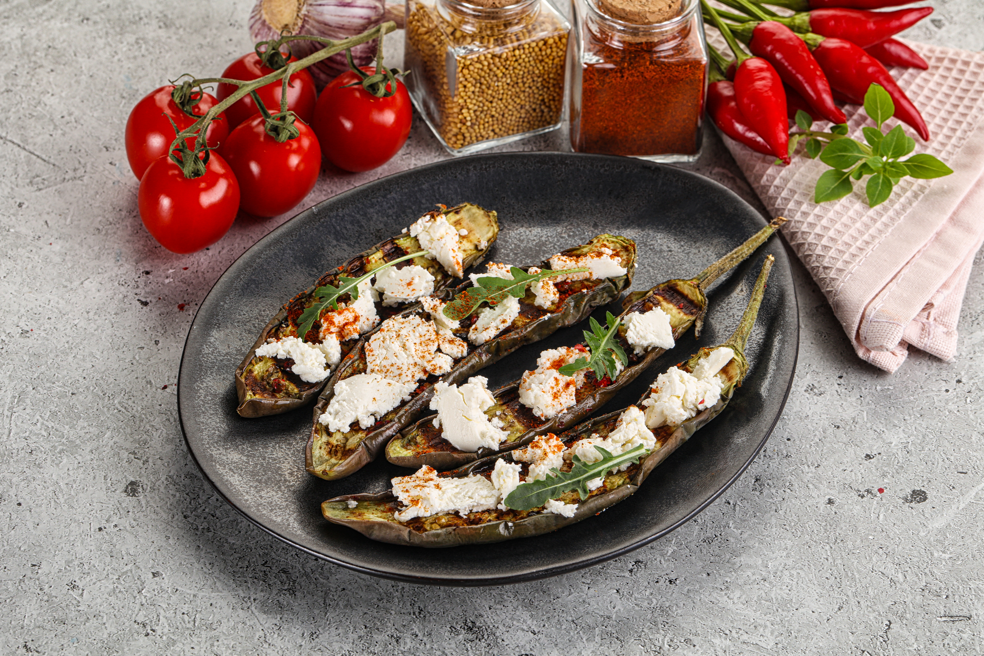 Overhead flat-lay of all ingredients for Greek Saganaki Mussels with Ouzo and Feta laid out on a kitchen surface.