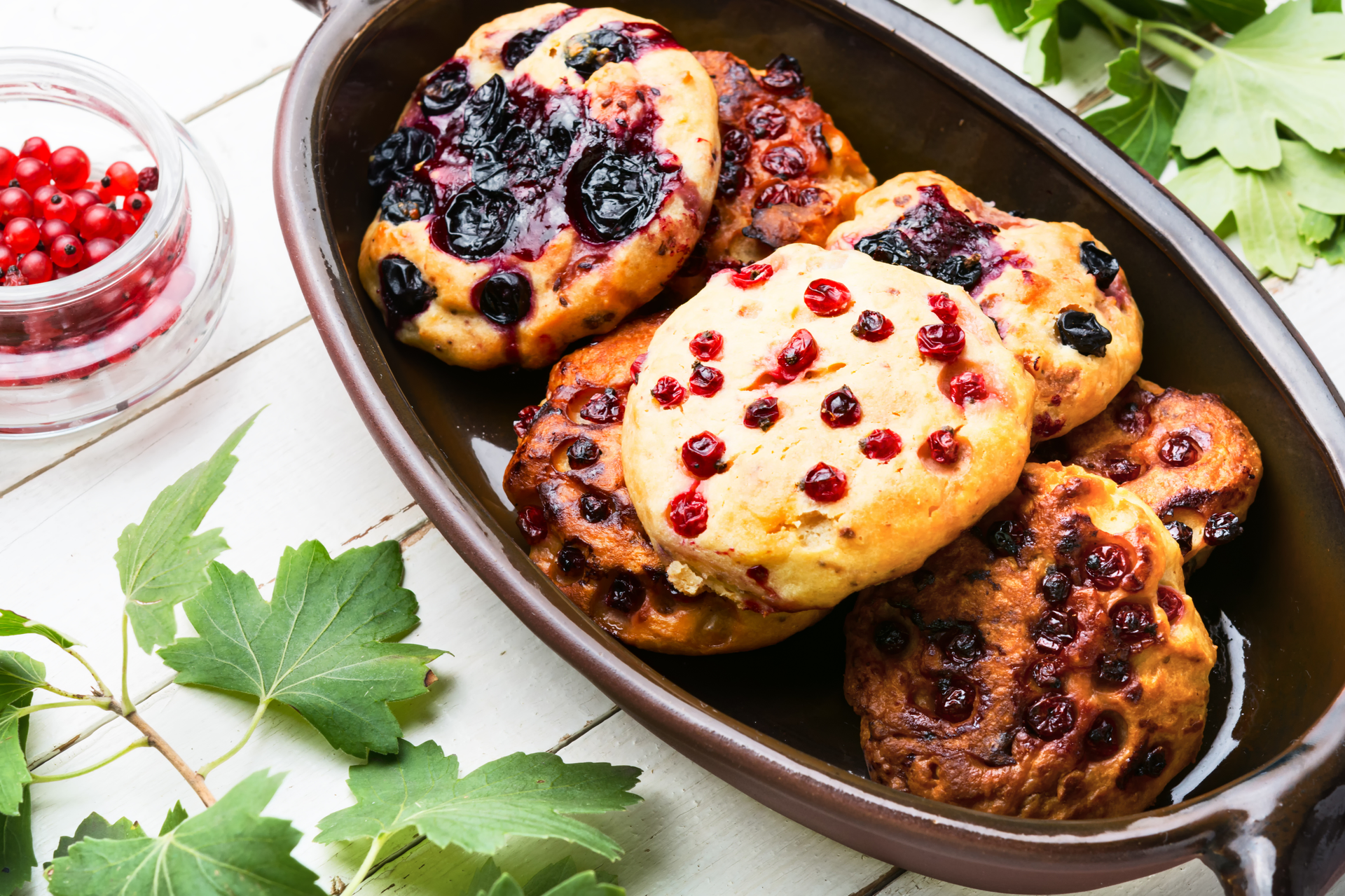 Overhead flat-lay of all ingredients for Hearty Canadian Bannock with Wild Berries and Maple laid out on a kitchen surface.