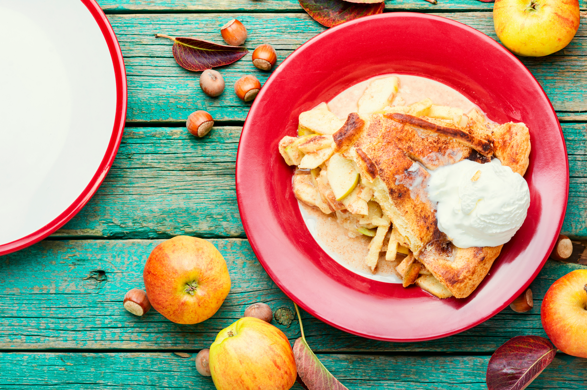 Overhead flat-lay of all ingredients for Hearty Hungarian Csirkepaprikás with Sour Cream laid out on a kitchen surface.