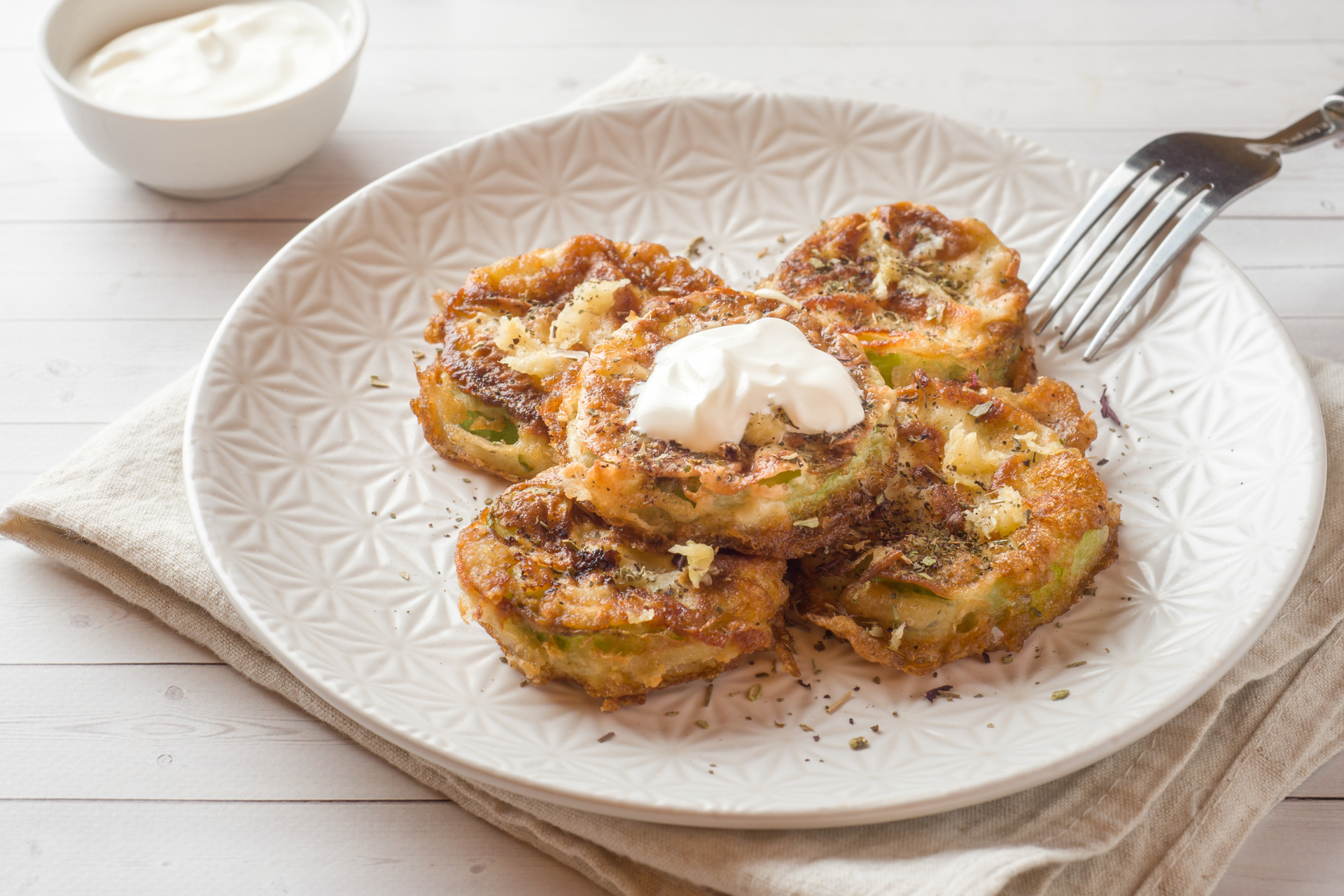 Hearty Irish Boxty with Sour Cream and Chives — Main Course served and photographed from above