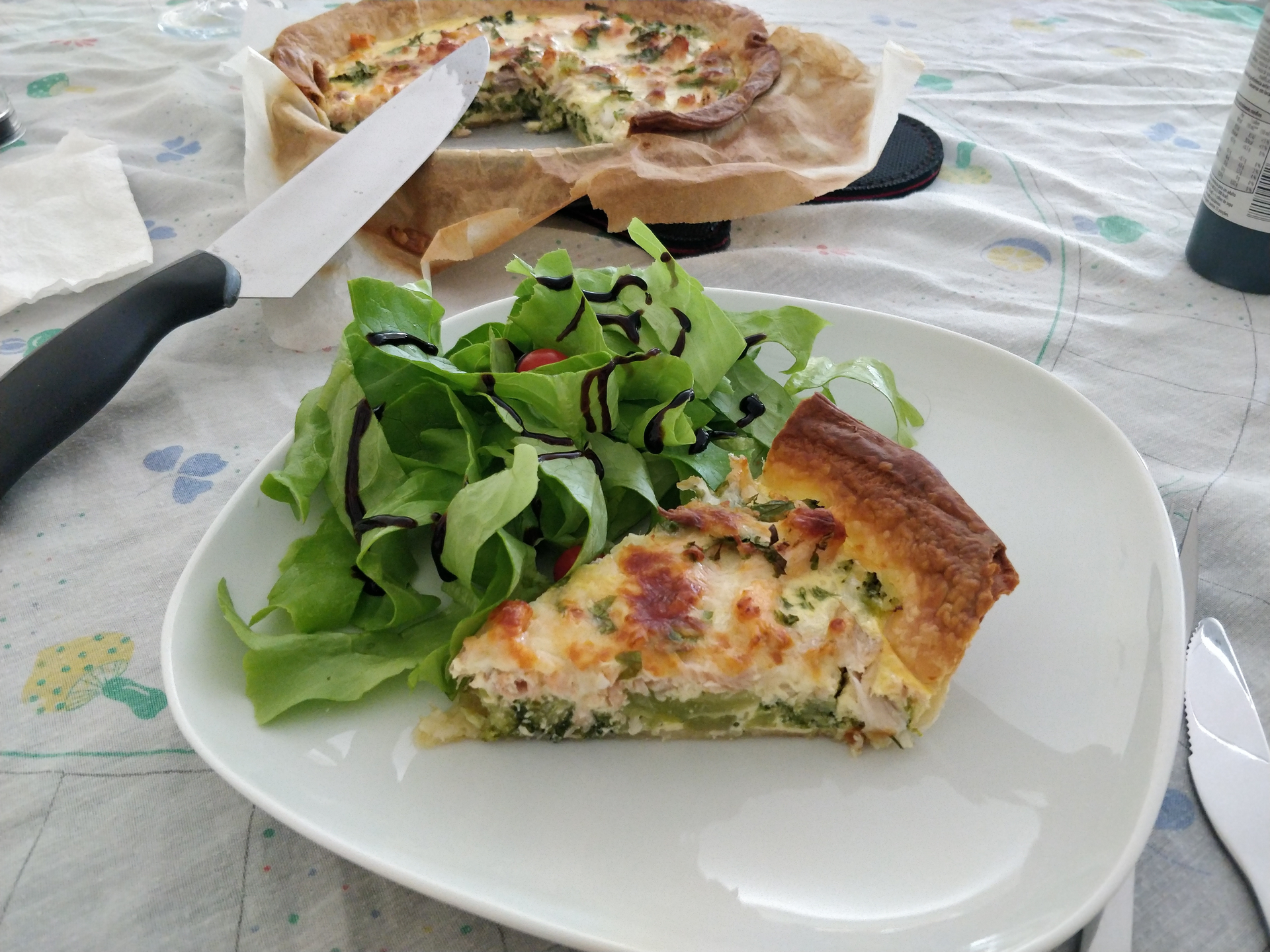 Overhead flat-lay of all ingredients for Herbaceous Croatian Strukli with Cheese and Spinach laid out on a kitchen surface.