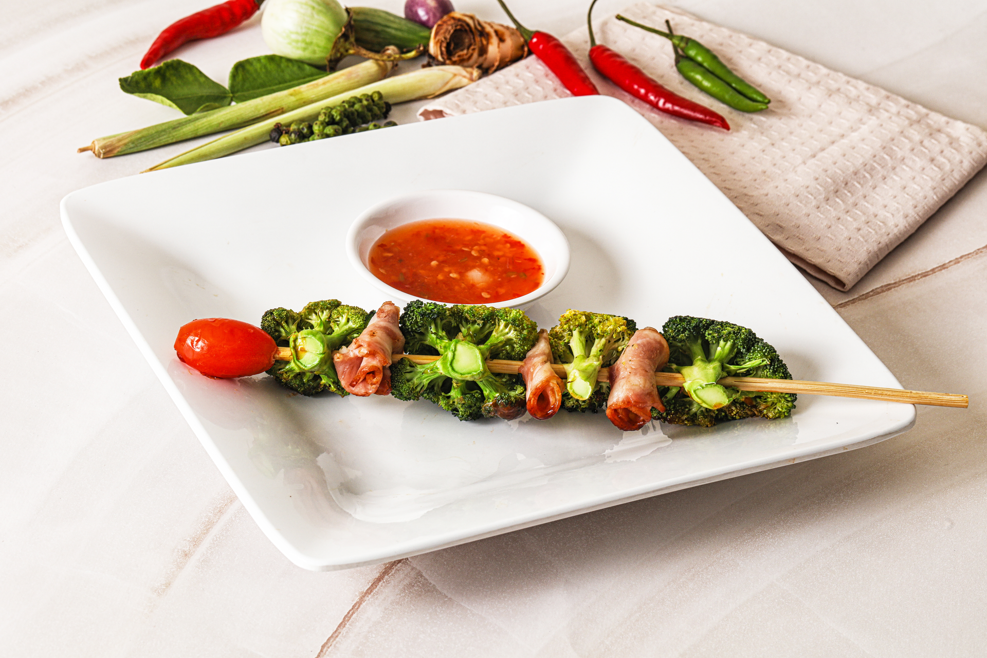 Herbal Thai Pandan Chicken Skewers with Sweet Tamarind Sauce — Appetizer served and photographed from above